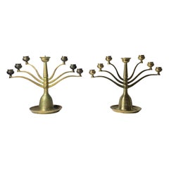Coppia di candelabri snodabili in bronzo Bruno Paul