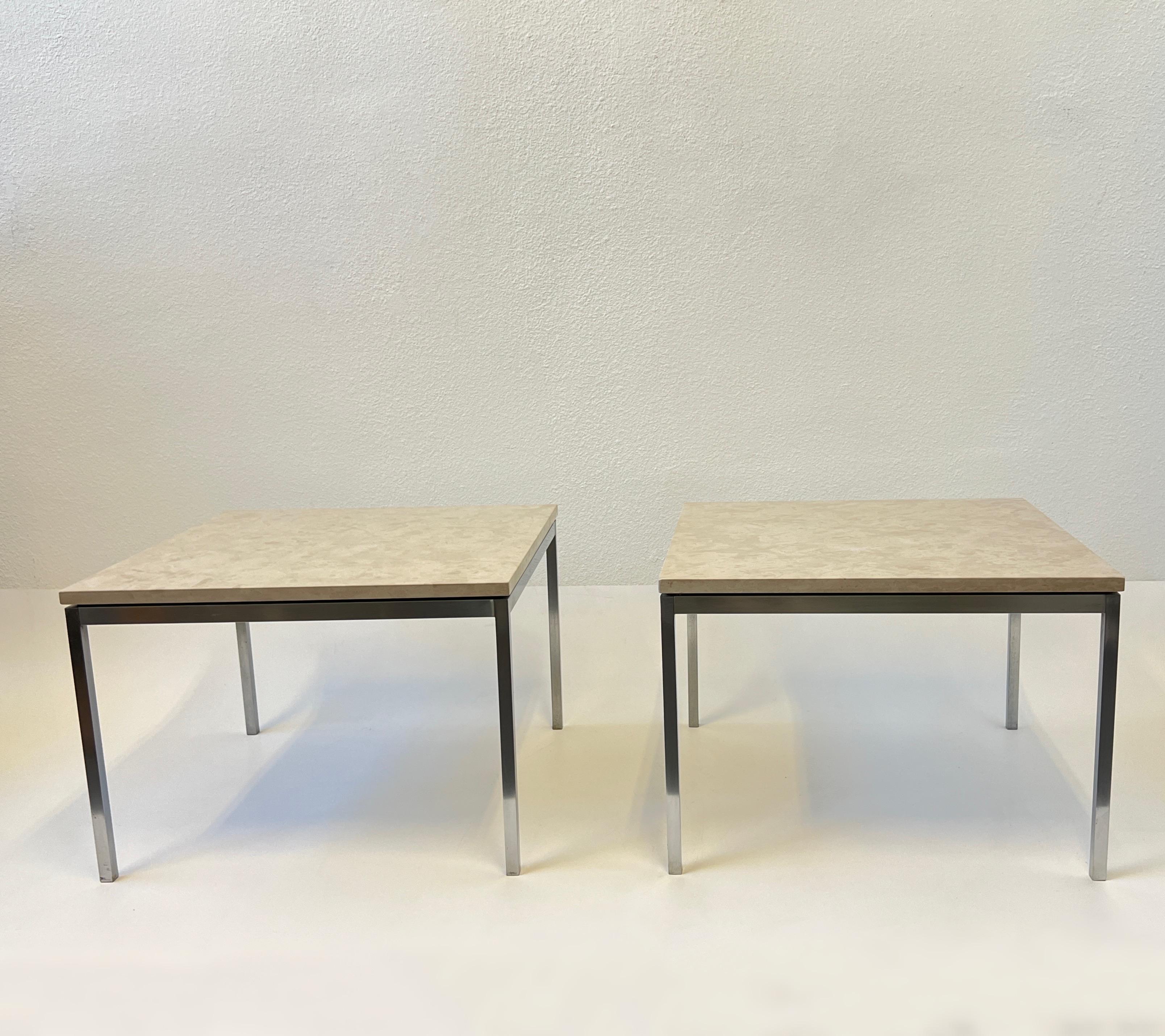 Iconic 1960’s pair of side tables designed by Florence Knoll for Knoll Associates. 
The frames are brushed stainless steel with off white granite tops. 
This came out of NBC Studios. 
In beautiful vintage condition with knoll labels.

Measurements: