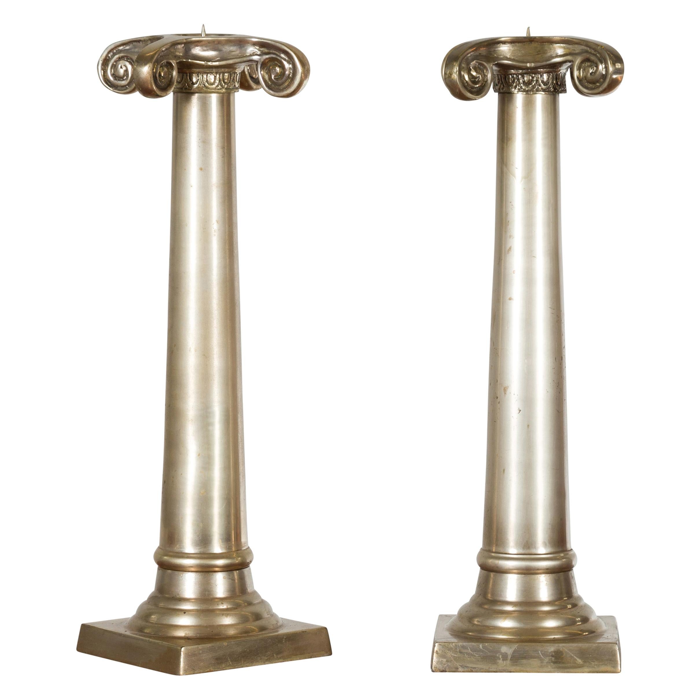 Pair of Brushed Silver over Bronze Column Candlesticks with Large Ionic Capitals For Sale