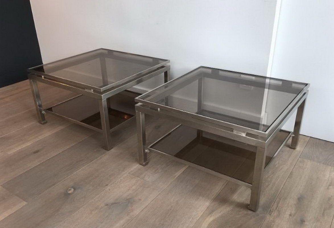 Mid-Century Modern Pair of brushed steel side tables with smoked glass by Guy Lefèvre  For Sale