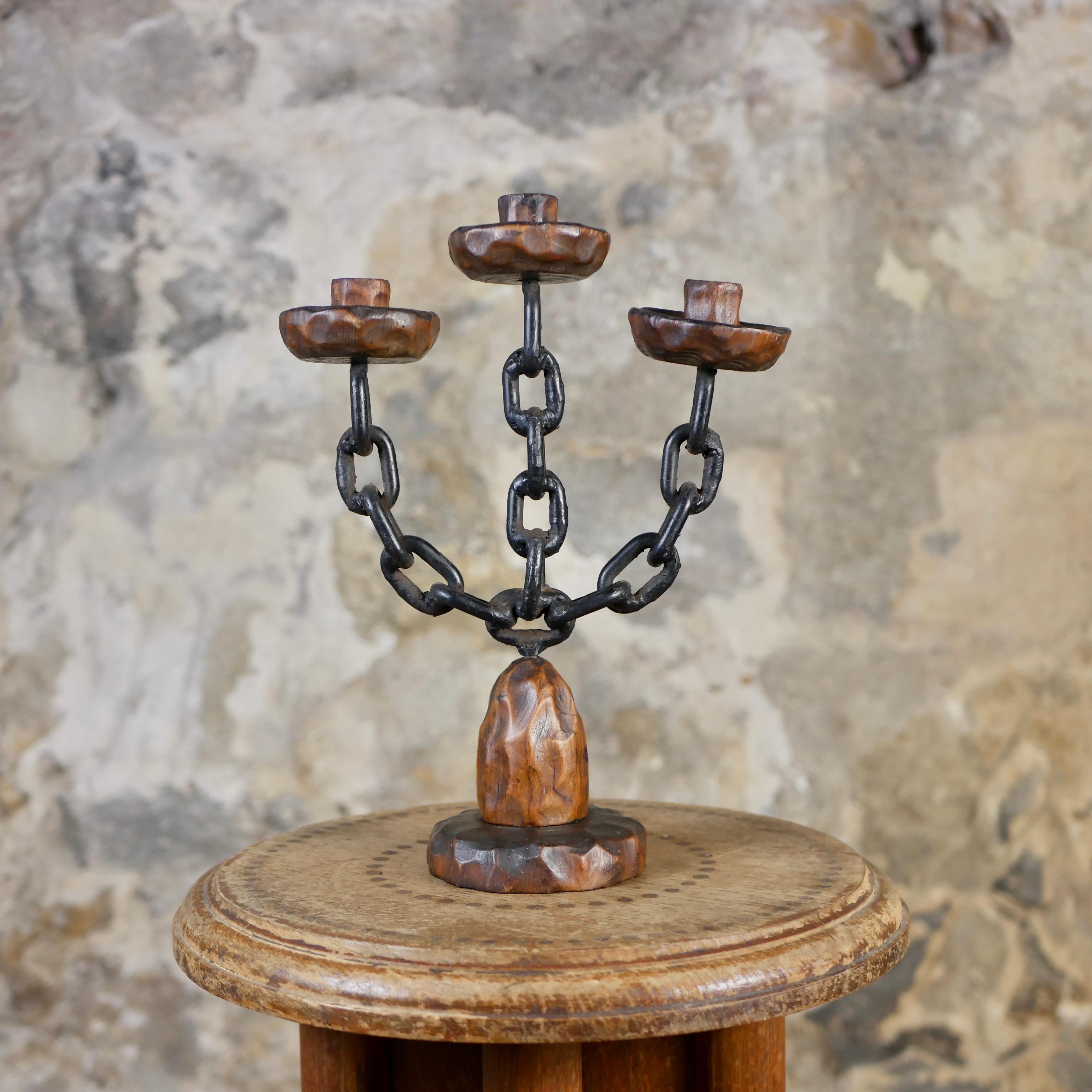 Brutalist Pair of brutalist candlesticks in wood and wrought iron, Spain, 1970s For Sale