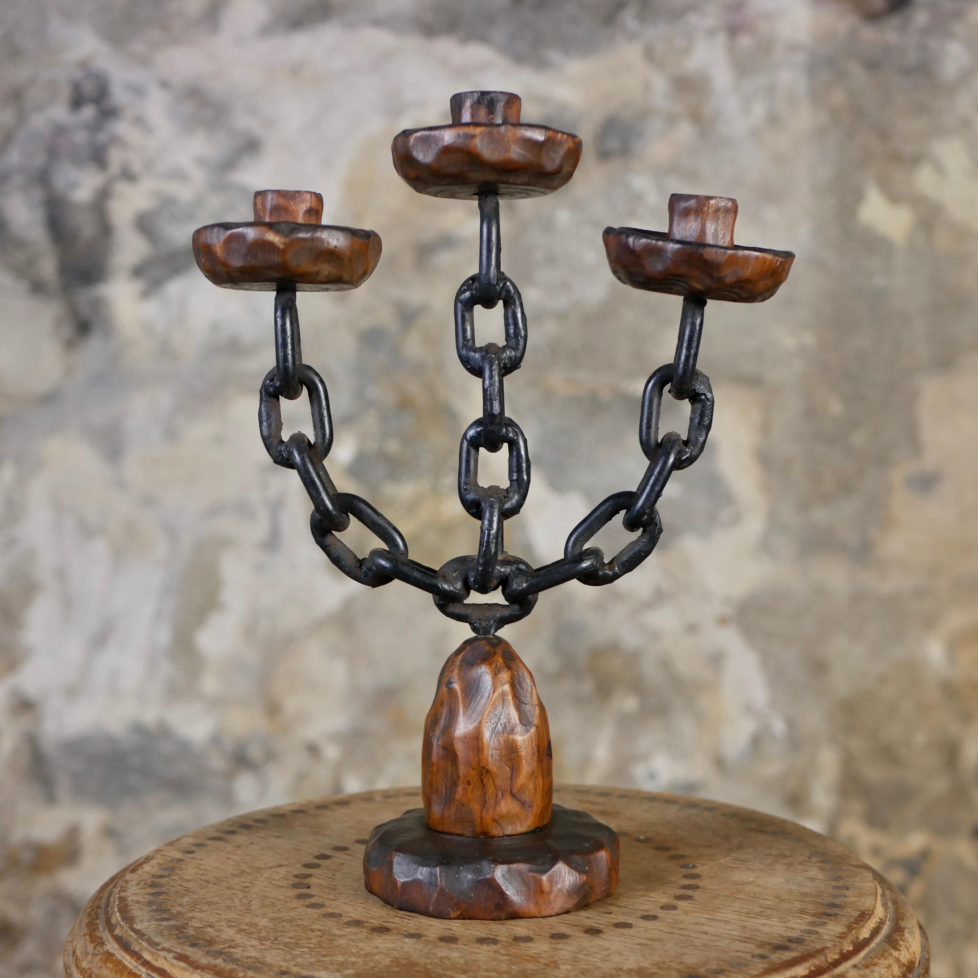 Spanish Pair of brutalist candlesticks in wood and wrought iron, Spain, 1970s For Sale