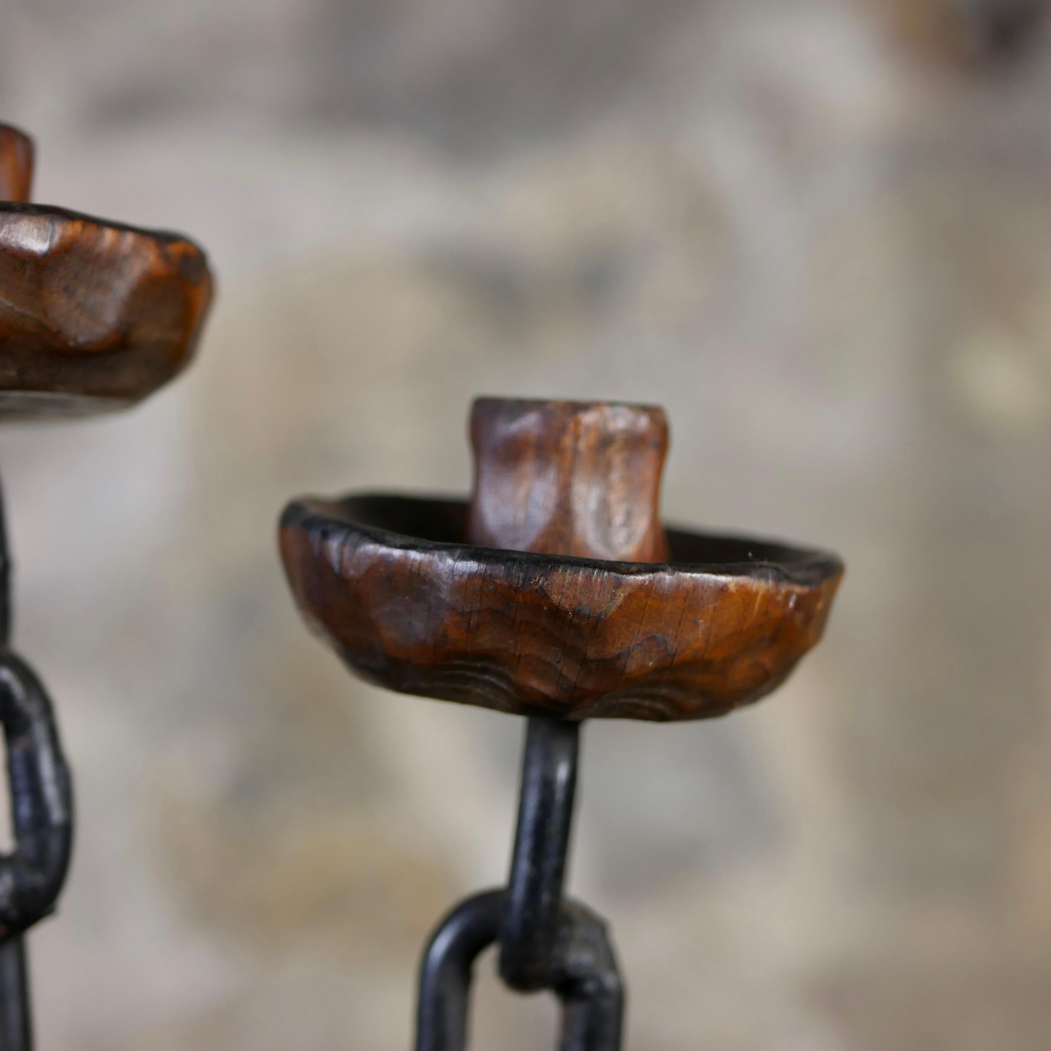 Pair of brutalist candlesticks in wood and wrought iron, Spain, 1970s For Sale 1