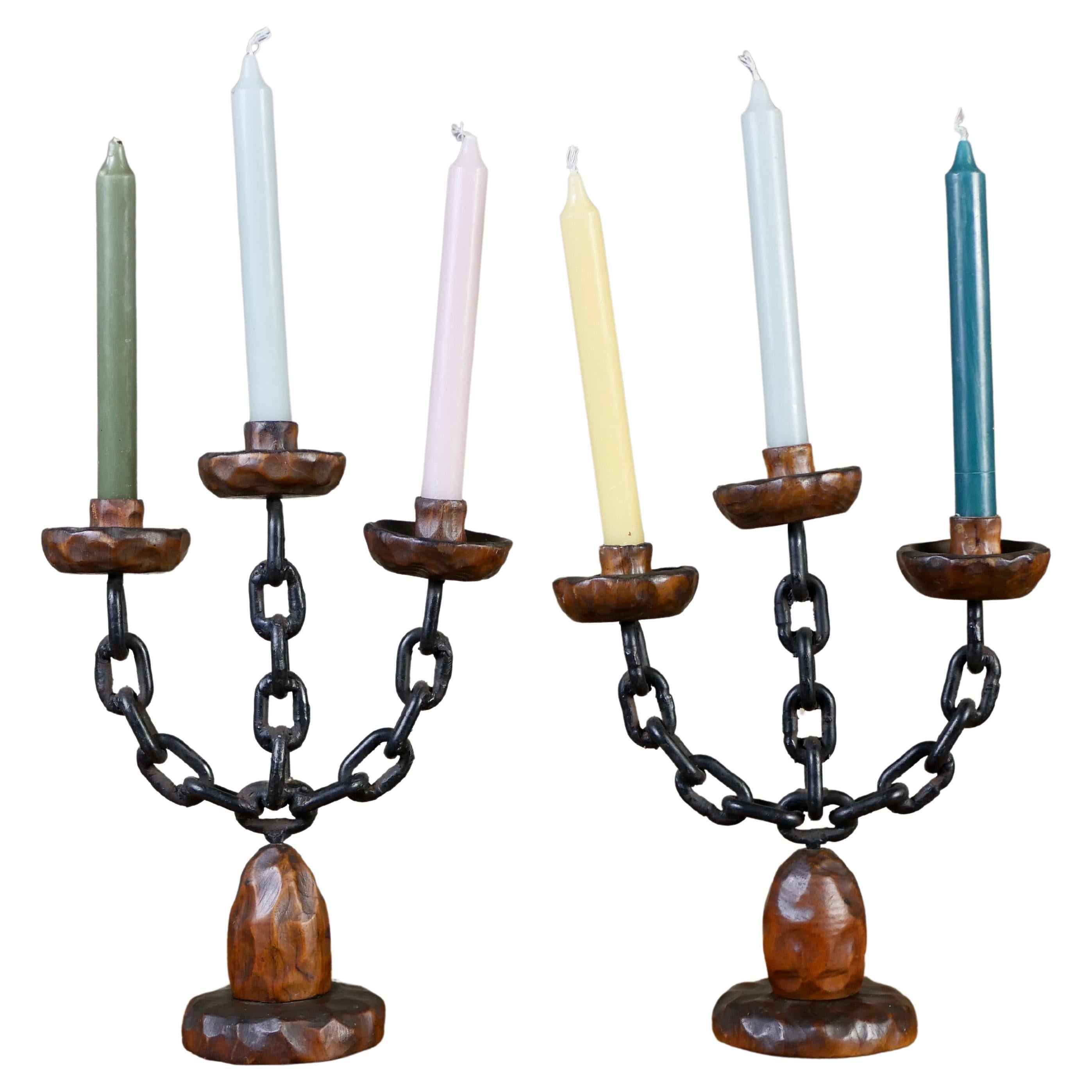 Pair of brutalist candlesticks in wood and wrought iron, Spain, 1970s For Sale