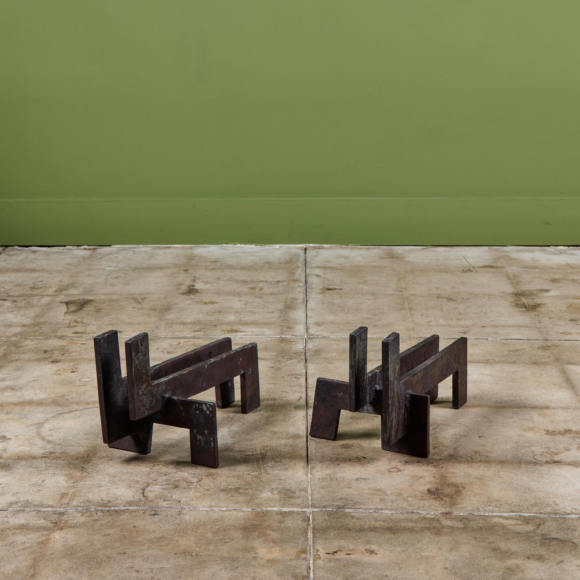 Pair of cast iron andirons featuring squared edges and clean lines.

Dimensions
9