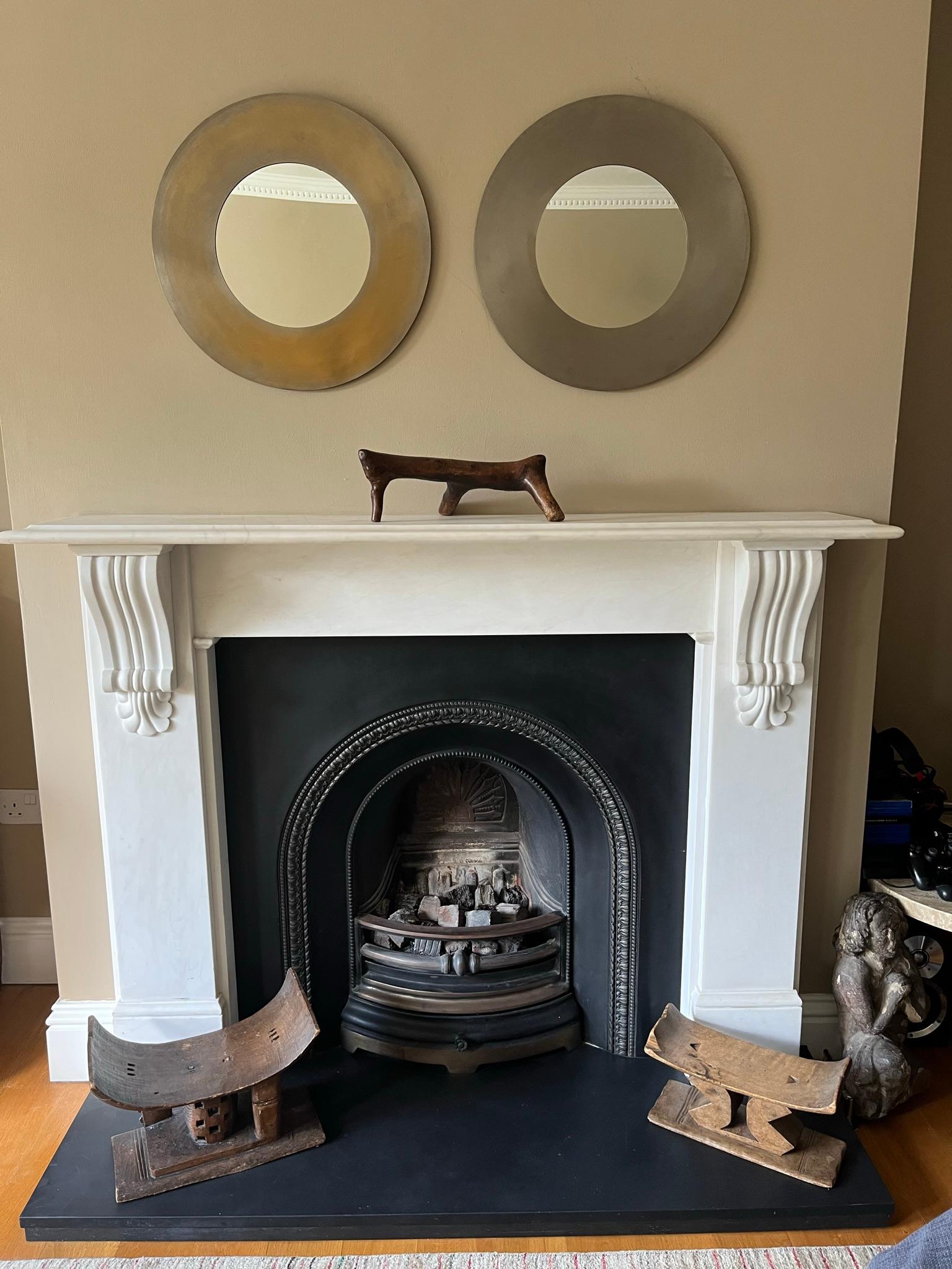 Pair of brutalist French 1970’s nickel on brass circular mirrors. On one of the mirrors the nickel has worn through revealing the brass underneath so slight variation in colour.