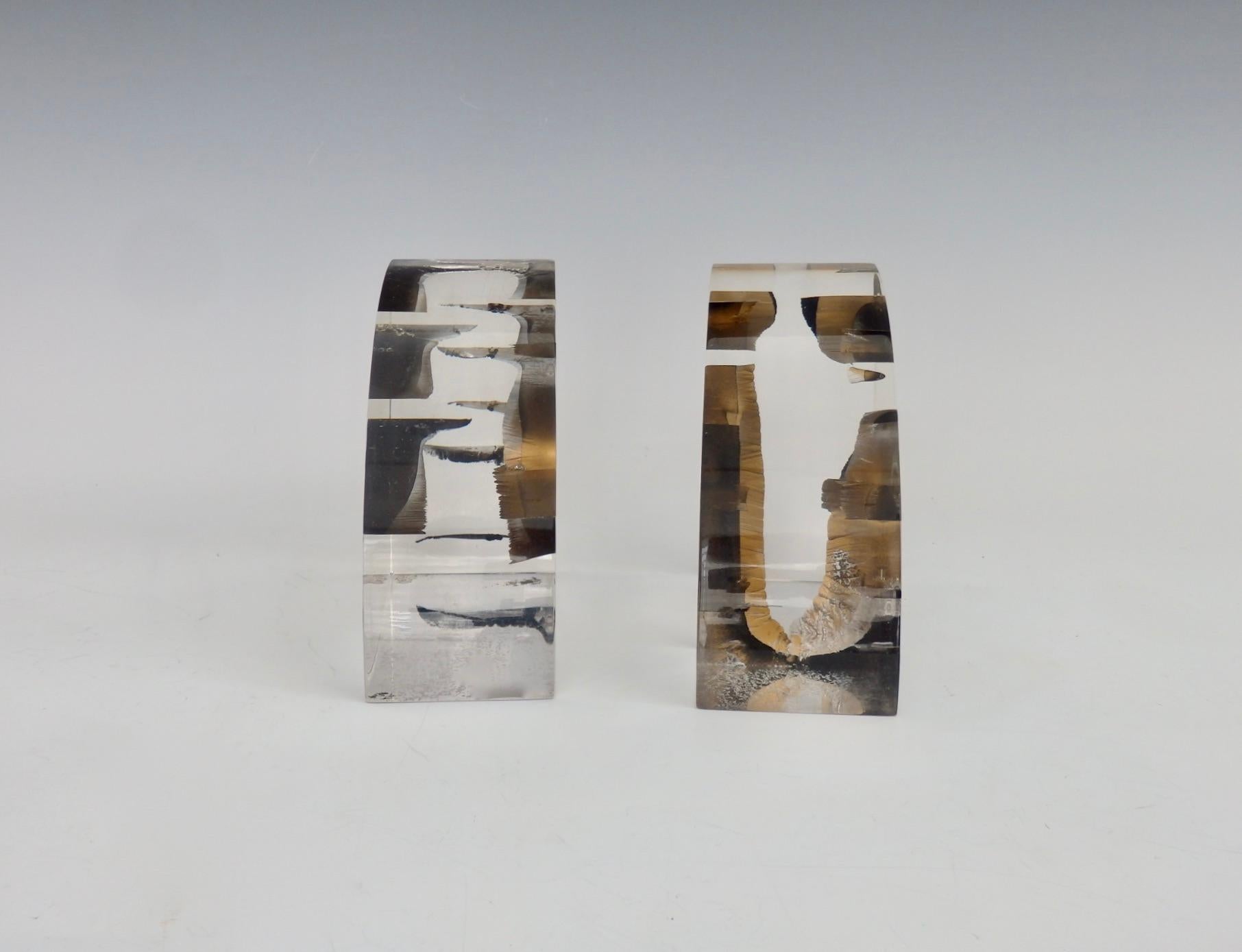 Polished Pair of Brutalist Encased Steel Ribbon Lucite Bookends Attributed to Astrolite