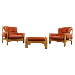 Pair of brutalist leather armchairs, 1960s