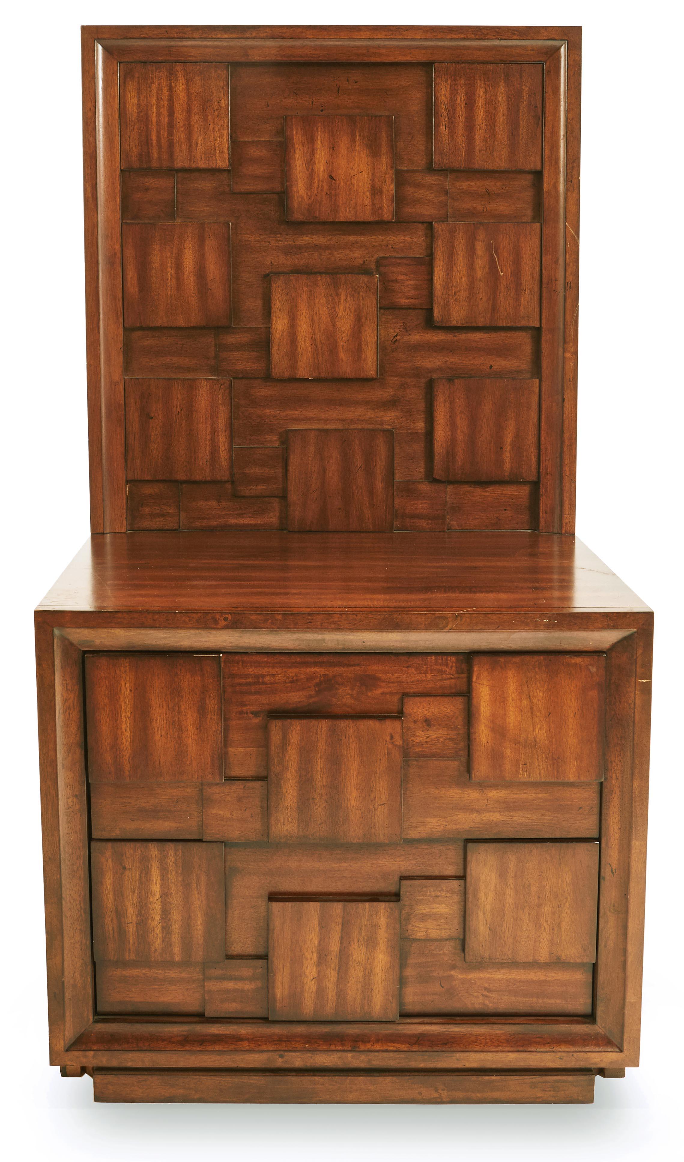 Pair of Brutalist mahogany bedside tables with two drawers and high back panels with a geometric relief design of squares (priced as pair).