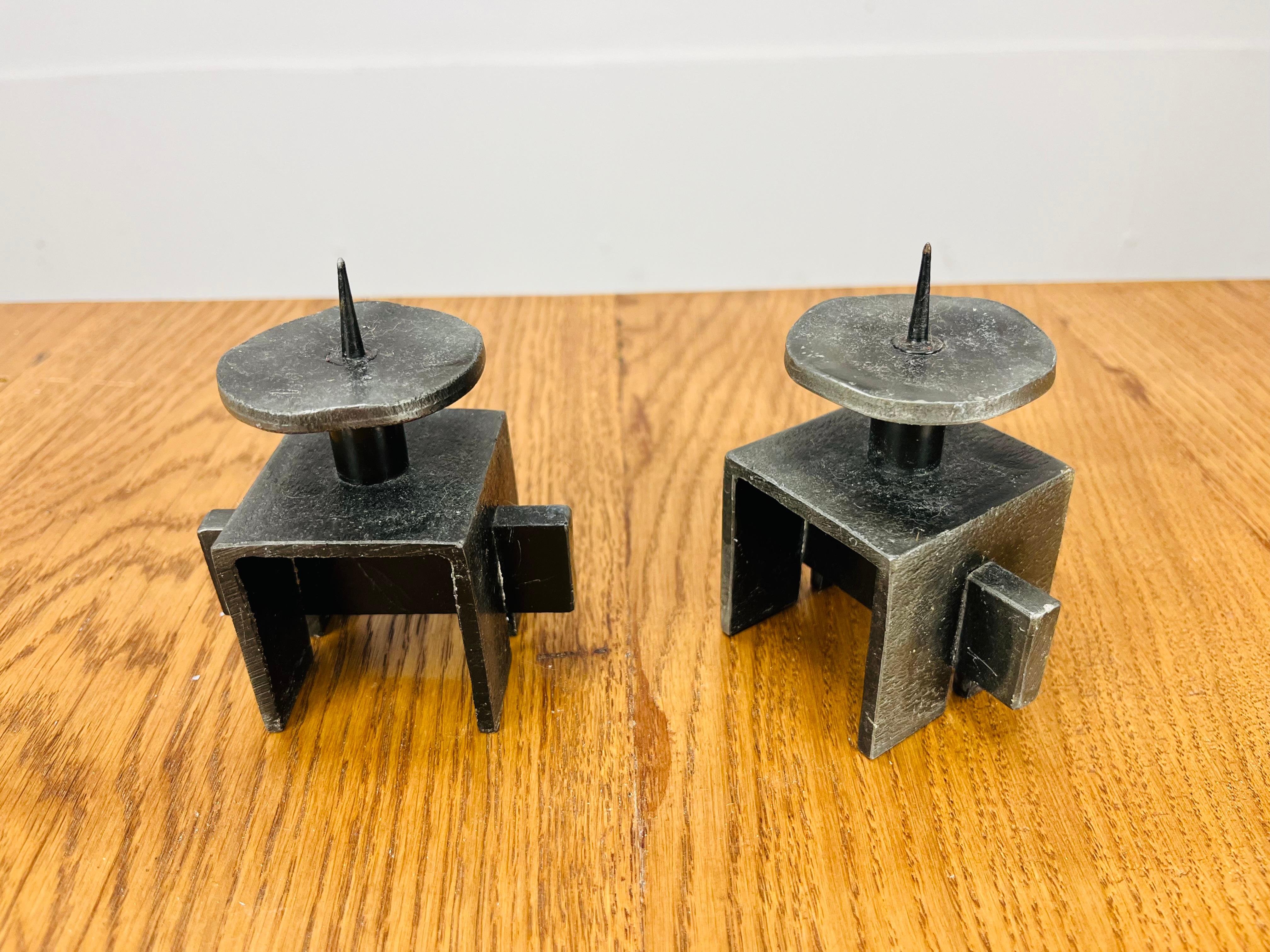 Pair of mid century and brutalist style wrought iron candle holders. Perfect condition. 