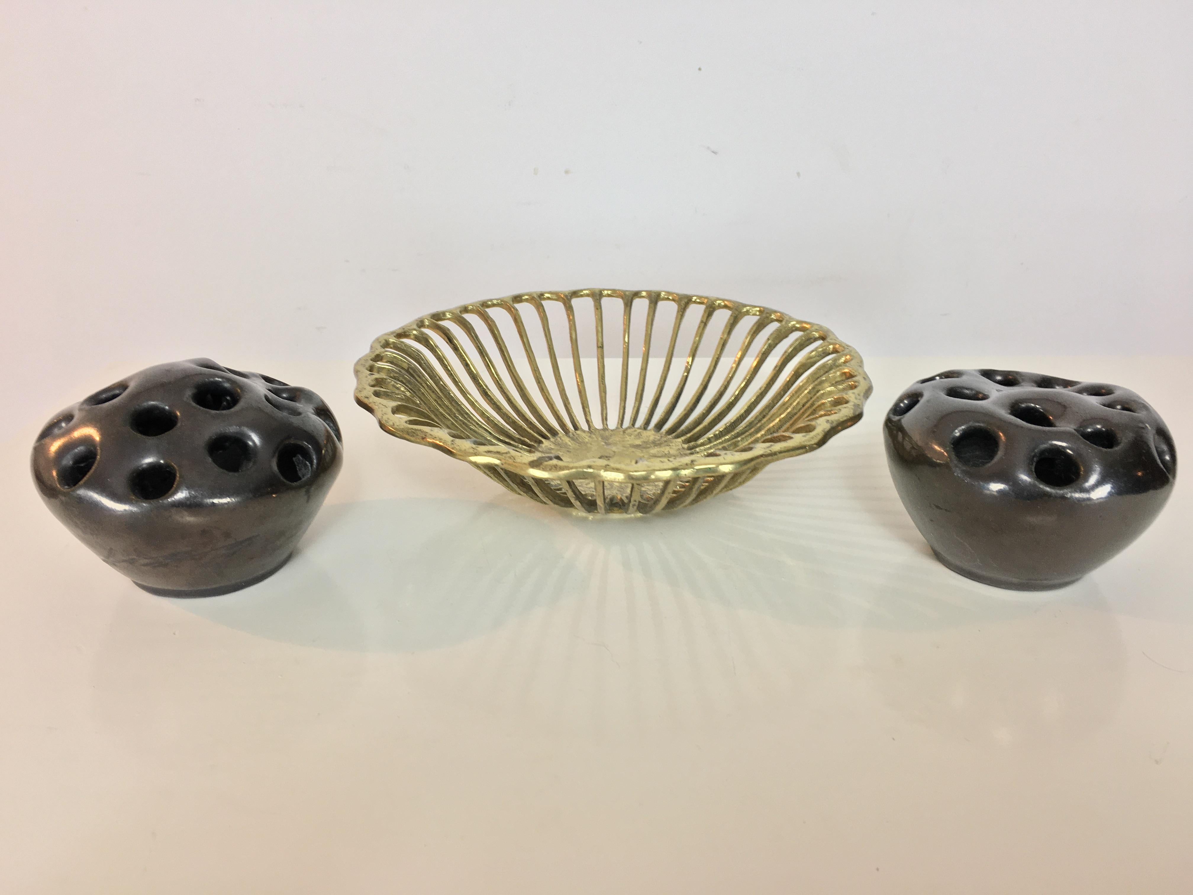 One of a kind pair of organic and brutalist ceramic vases, black, perfect condition. They are both signed, but wasn't able to identify the artist.