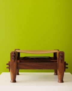 Pair of brutalist safari ottomans