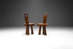 Pair of Brutalist Solid Wood Low Tripod Chairs, France 1960s
