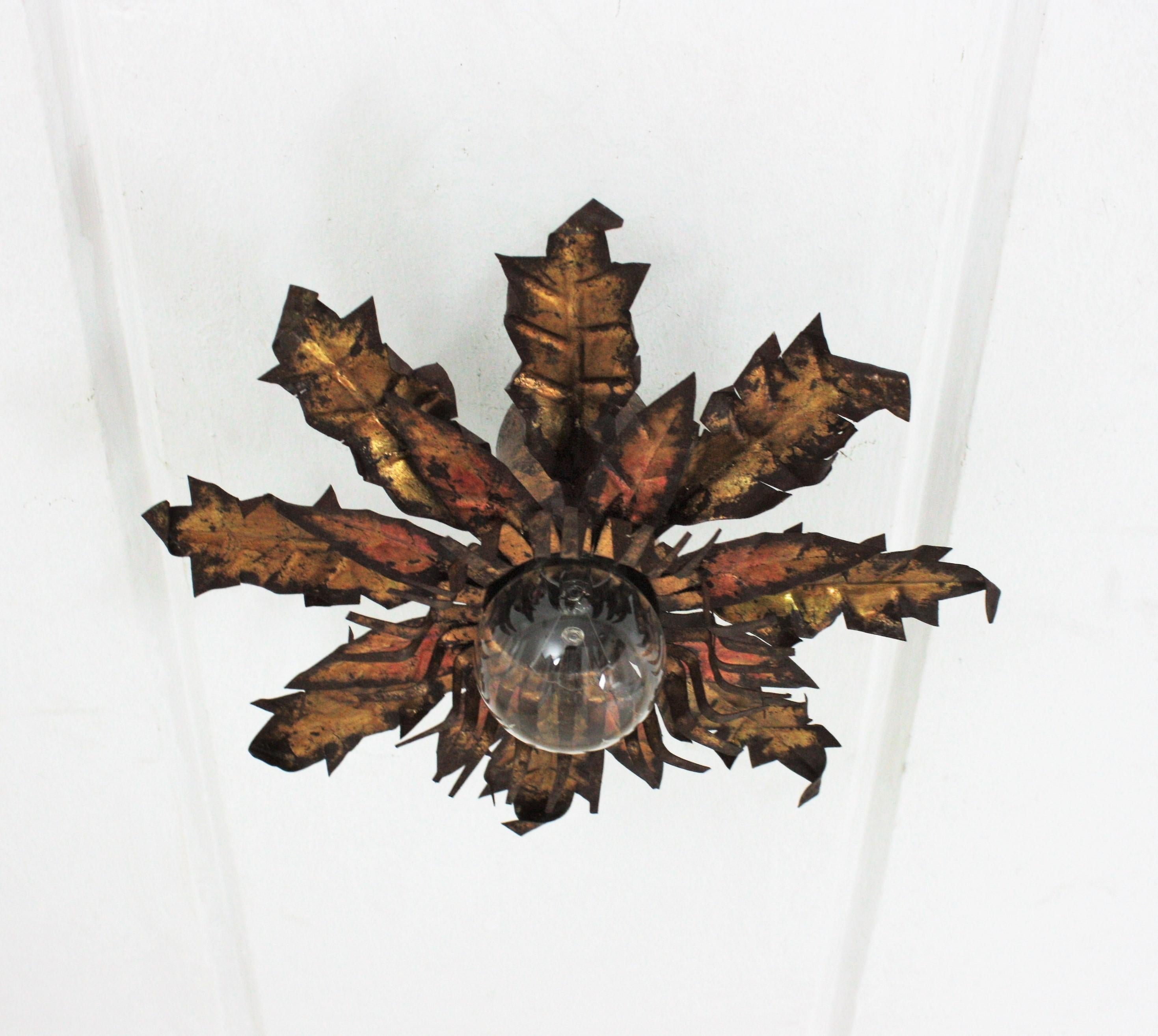 20th Century Pair of Brutalist Sunburst Flower Light Fixtures in Gilt Metal For Sale