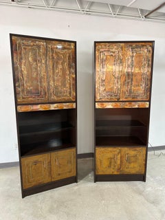 Pareja de vitrinas brutalistas de cobre cortado con soplete