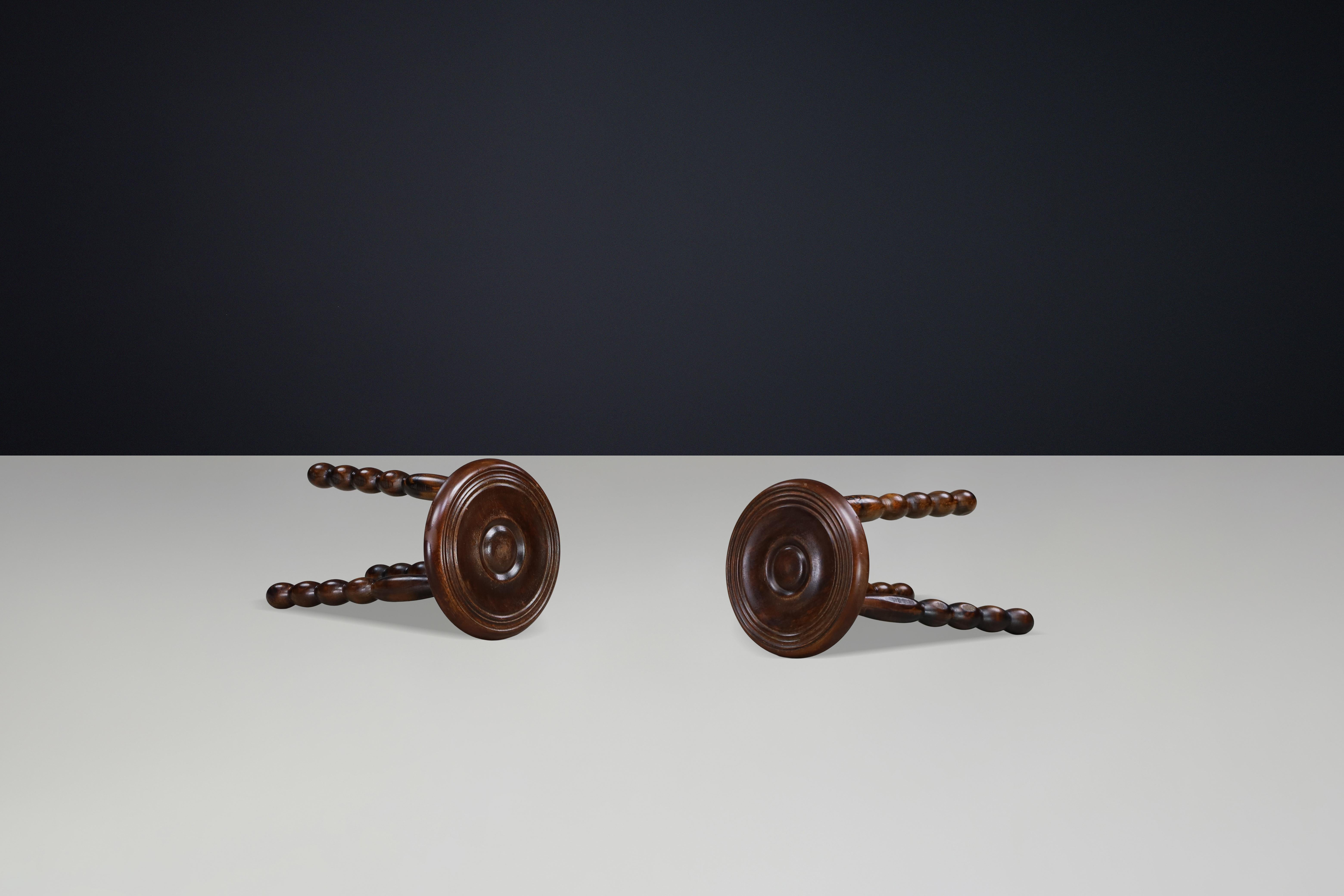 Pair of Brutalist Walnut Stools in the Manner of Charles Dudouyt, France, 1940s (Mitte des 20. Jahrhunderts) im Angebot