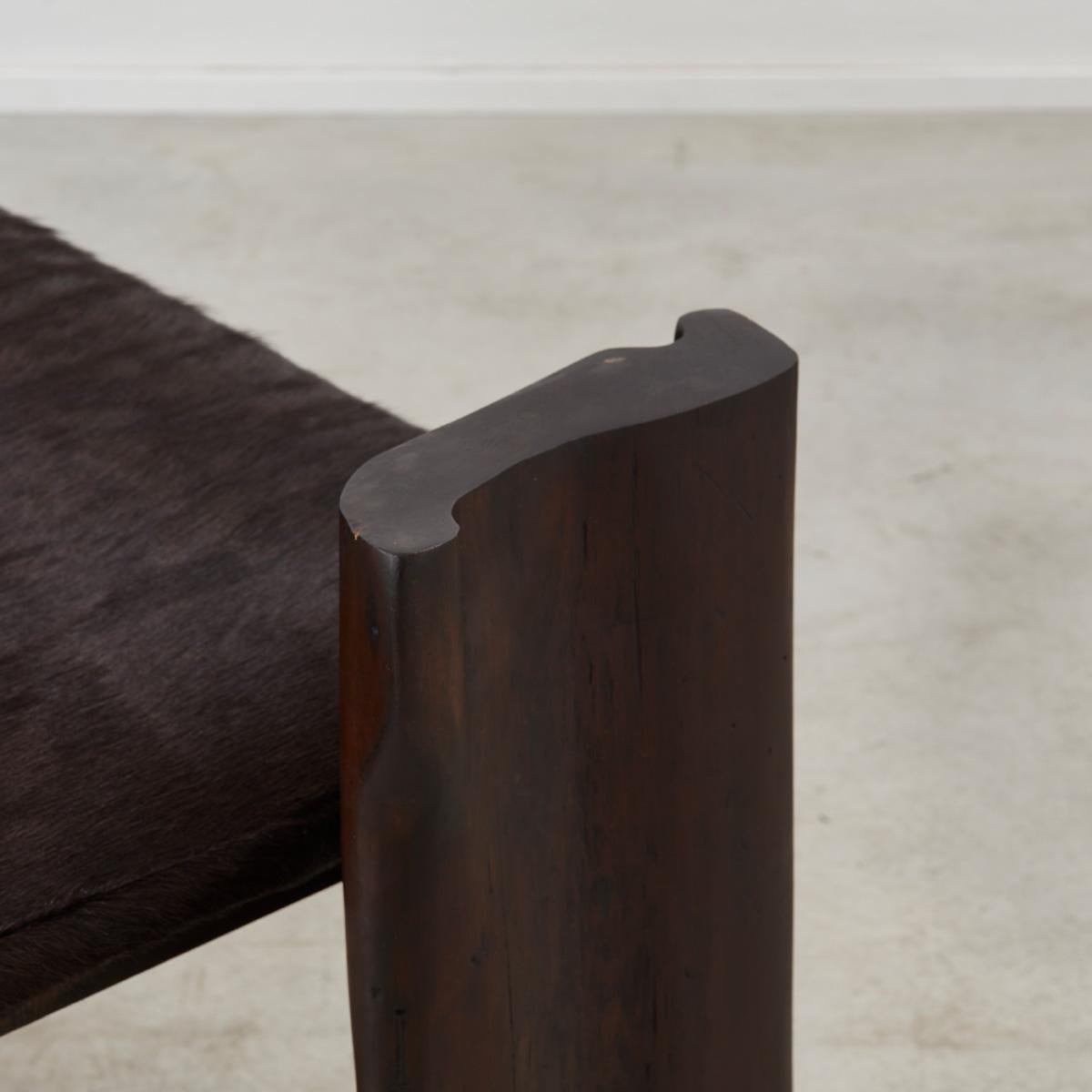 Pair of Brutalist wooden benches reupholstered in ponyhair, France 1970s For Sale 3