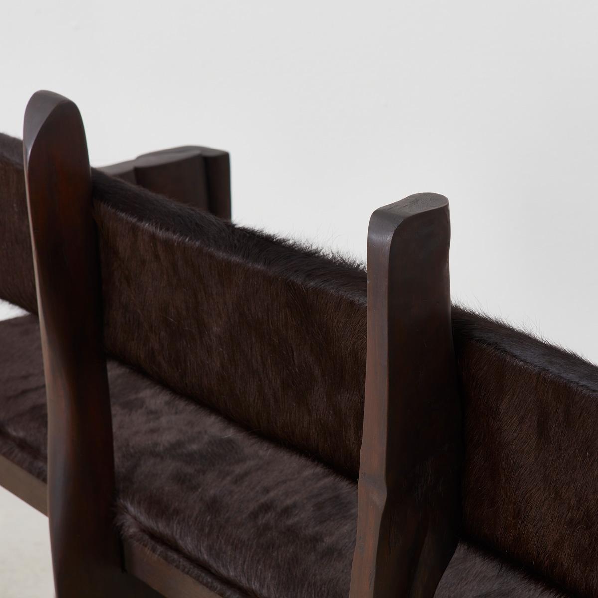 Pair of Brutalist wooden benches reupholstered in ponyhair, France 1970s For Sale 2