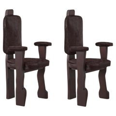 Pair of Brutalist wooden hallway chairs reupholstered in ponyhair, France 1970s
