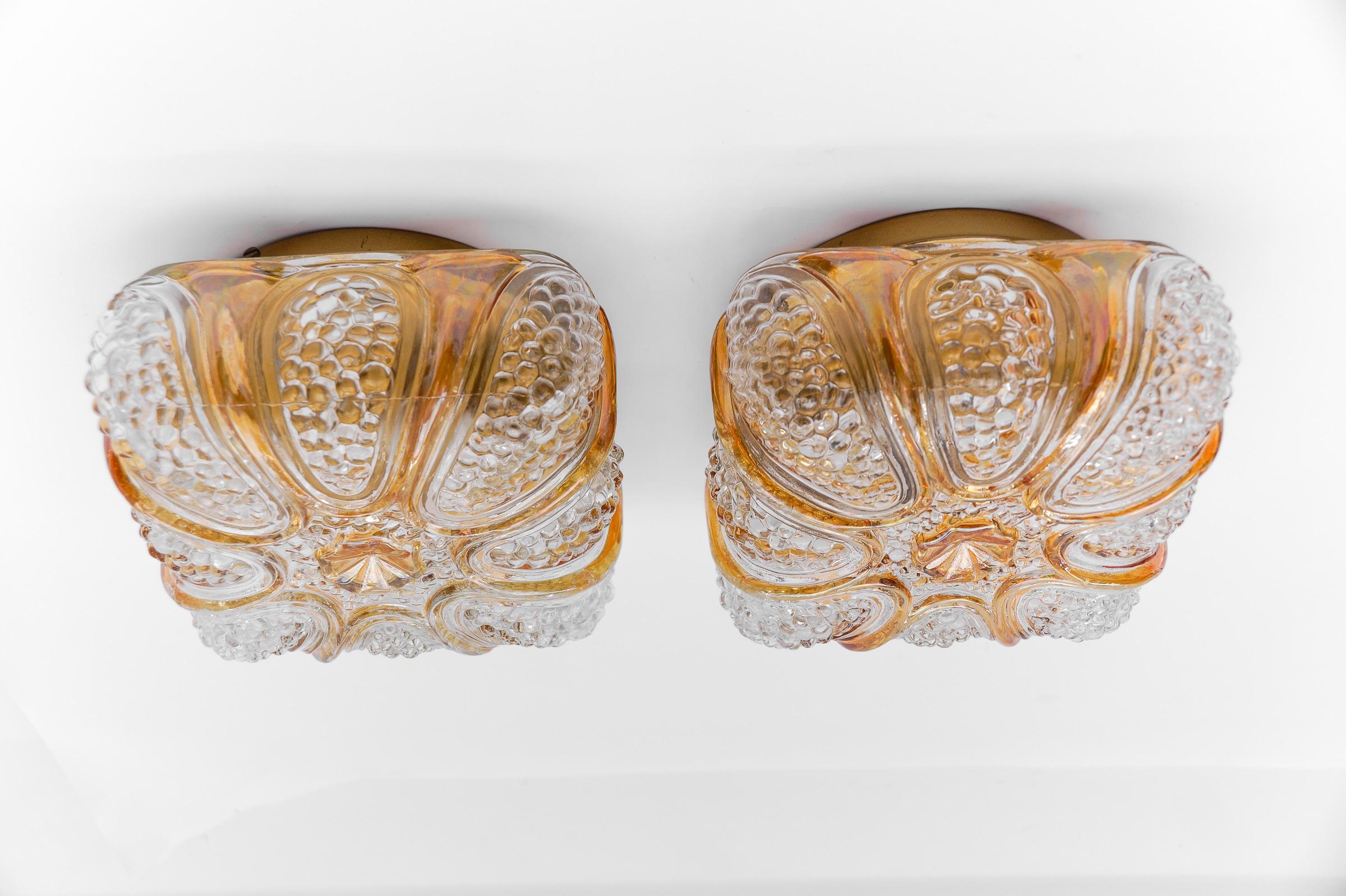 Pair of Bubble Glass Wall Lamps or Flush Mounts, 1960s Limburg

The fixture need 1 x E27 standard bulb with 60W max.

Light bulbs are not included. 
It is possible to install this fixture in all countries (US, Australia, Asia, UK, Europe,..)

 