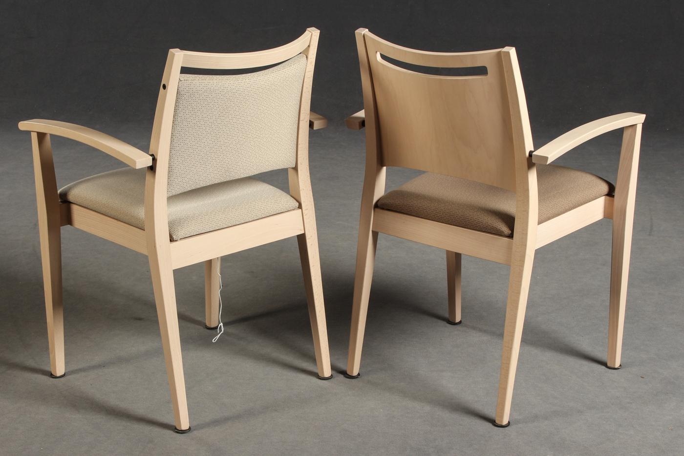 Pair of chairs by Brunner. Model Buena Nova. Design by Roland Schmidt, LSS designer. Frame made of beech wood, with armrests. Different upholstery, colors and fabrics. 
