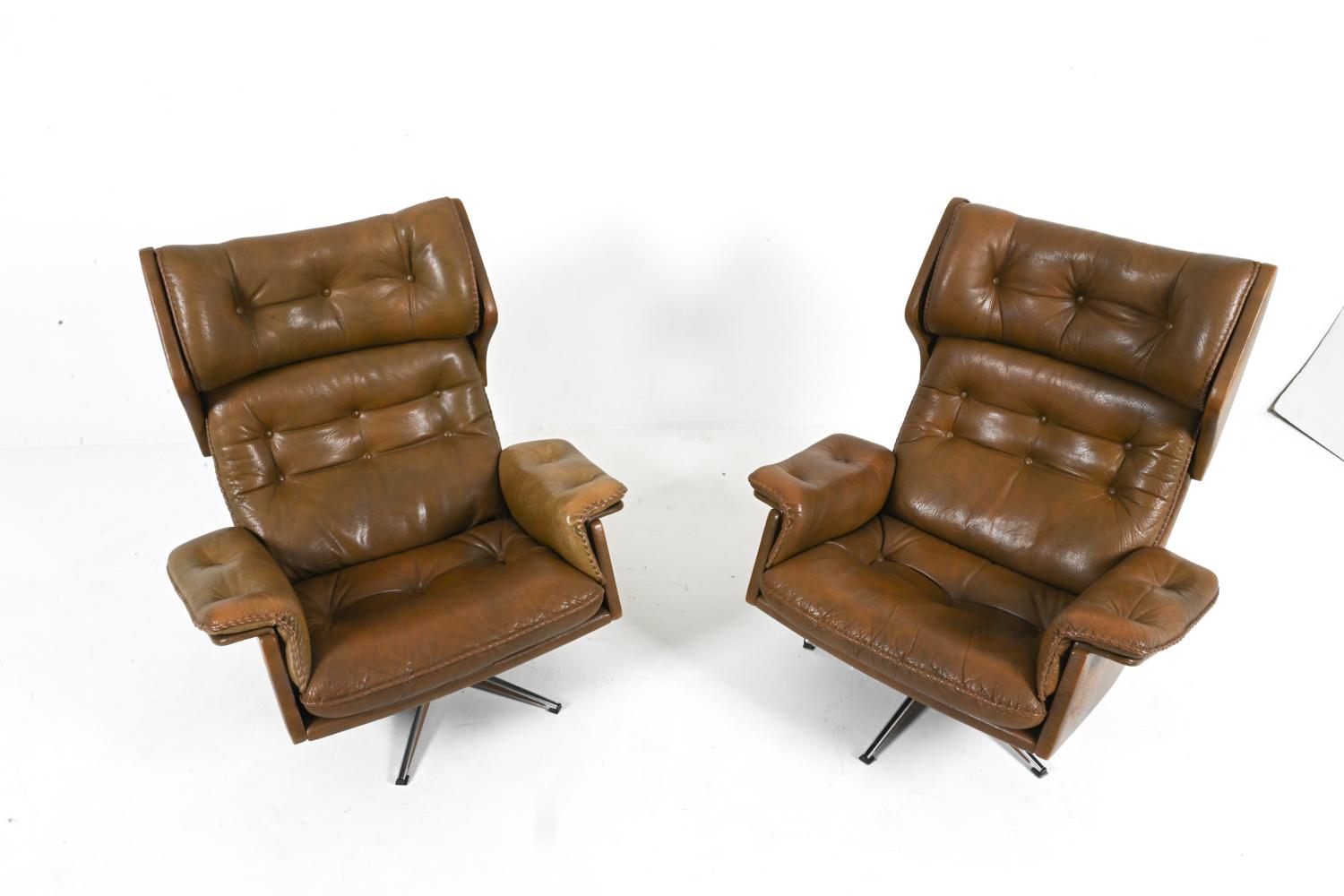 Mid-Century Modern Pair of Buffalo Leather Swivel Chairs By Arne Norell, Swedish 1960's For Sale