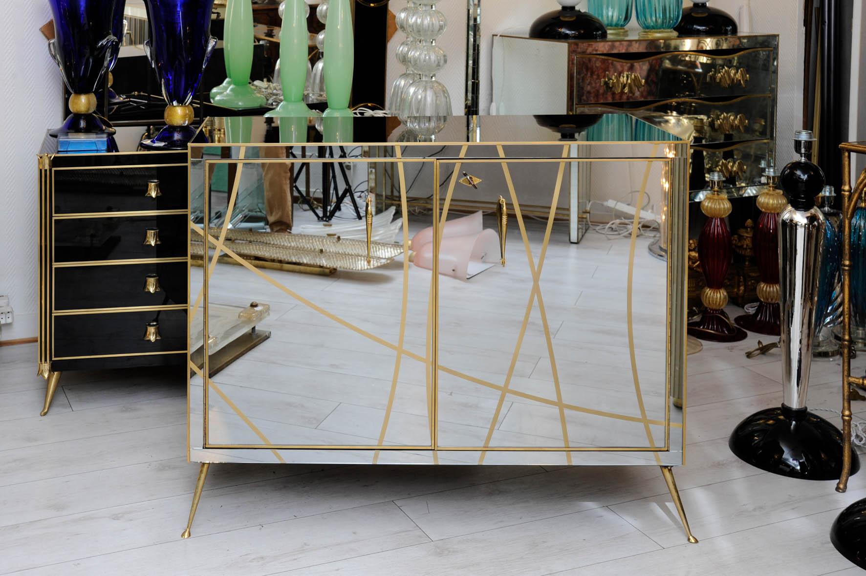 Pair of buffets all in clear and gold mirror.