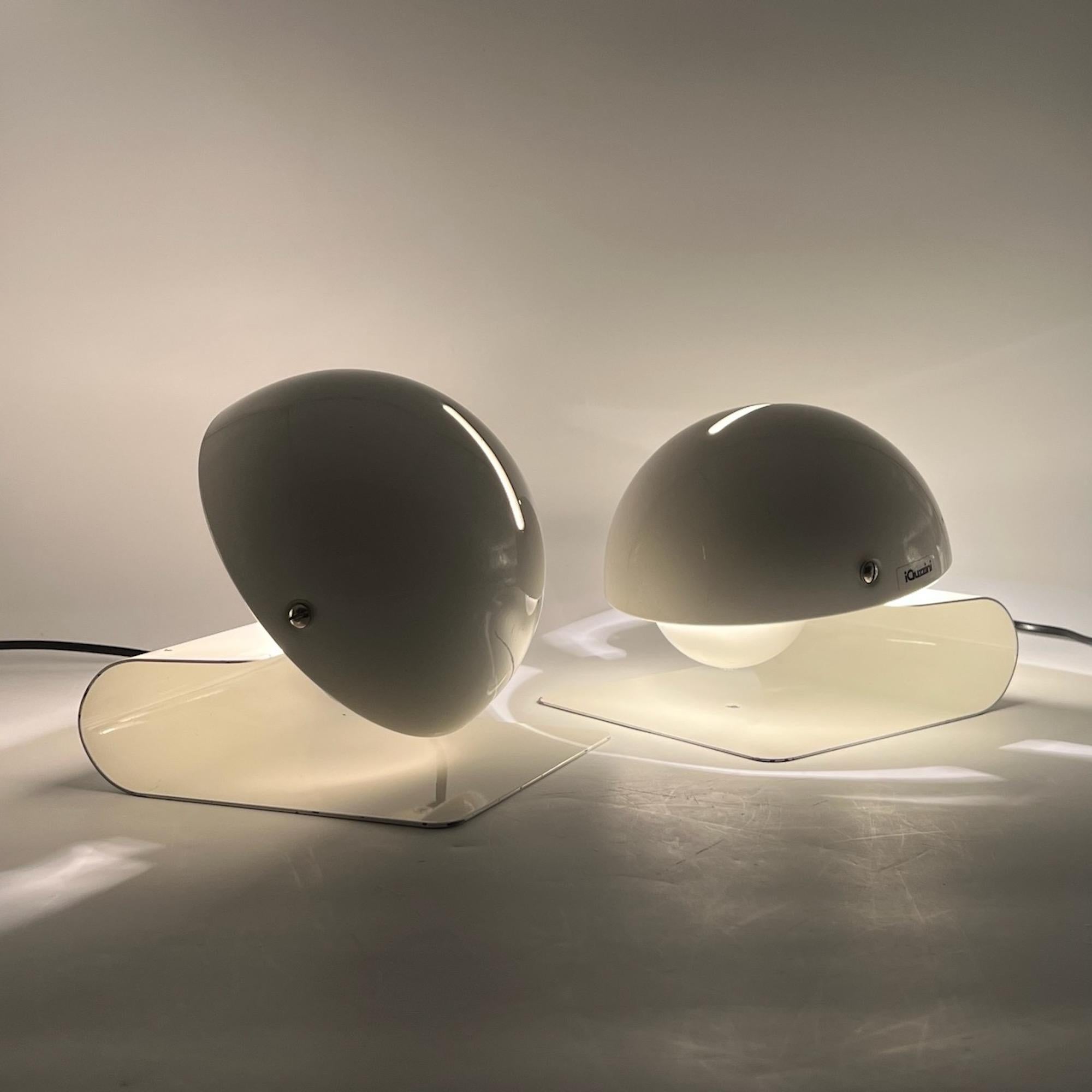 Beautiful set of ‘Bugia’ table lamps, designed by Giuseppe Cormio for the Milano 1975 Fair and expertly crafted by iGuzzini in 1976.

These lamps are made of a curved base crafted from a metal sheet with a tiltable half-globe lampshade allows for