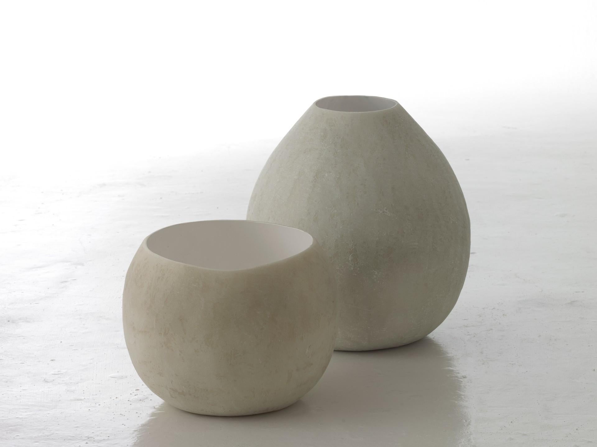 Pair of Bulbo vases by Imperfettolab
Dimensions: 
Ø 47 x H 50 cm
Ø 47 x H 42 cm
Materials: Raw material


Imperfetto Lab
Who we are ? We are a family.
Verter Turroni, Emanuela Ravelli and our children Elia, Margherita and Eusebio.
All together, we