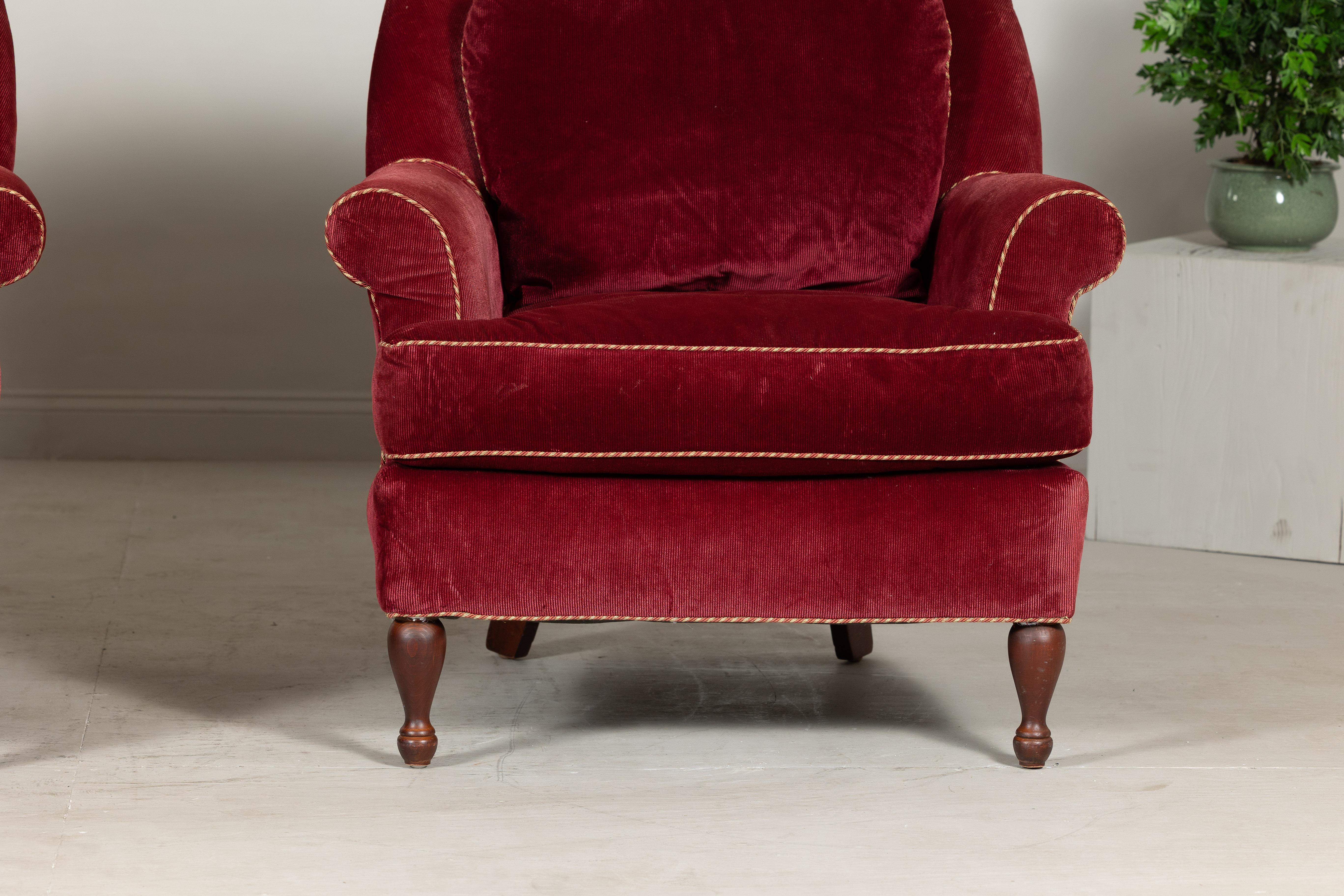 Fabric Pair of Burgundy Velvet Club Chairs with Rolled Arms and Turned Legs For Sale