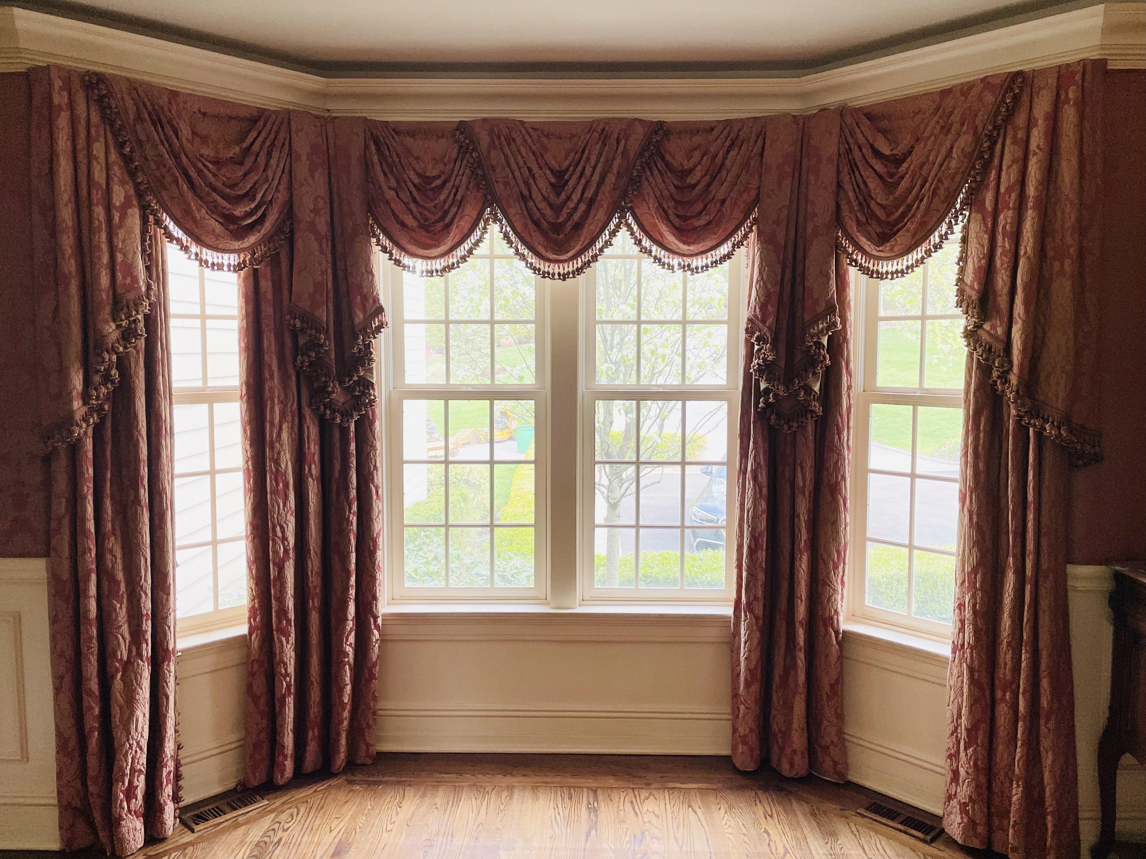 A Pair of Burgundy Wall or Window Treatments, Curtains, A stunning set of Scalamandré Window Treatments. This large and impressive set of lined curtains can easily be taken down to accommodate any smaller grouping of windows or doors. Can purchase