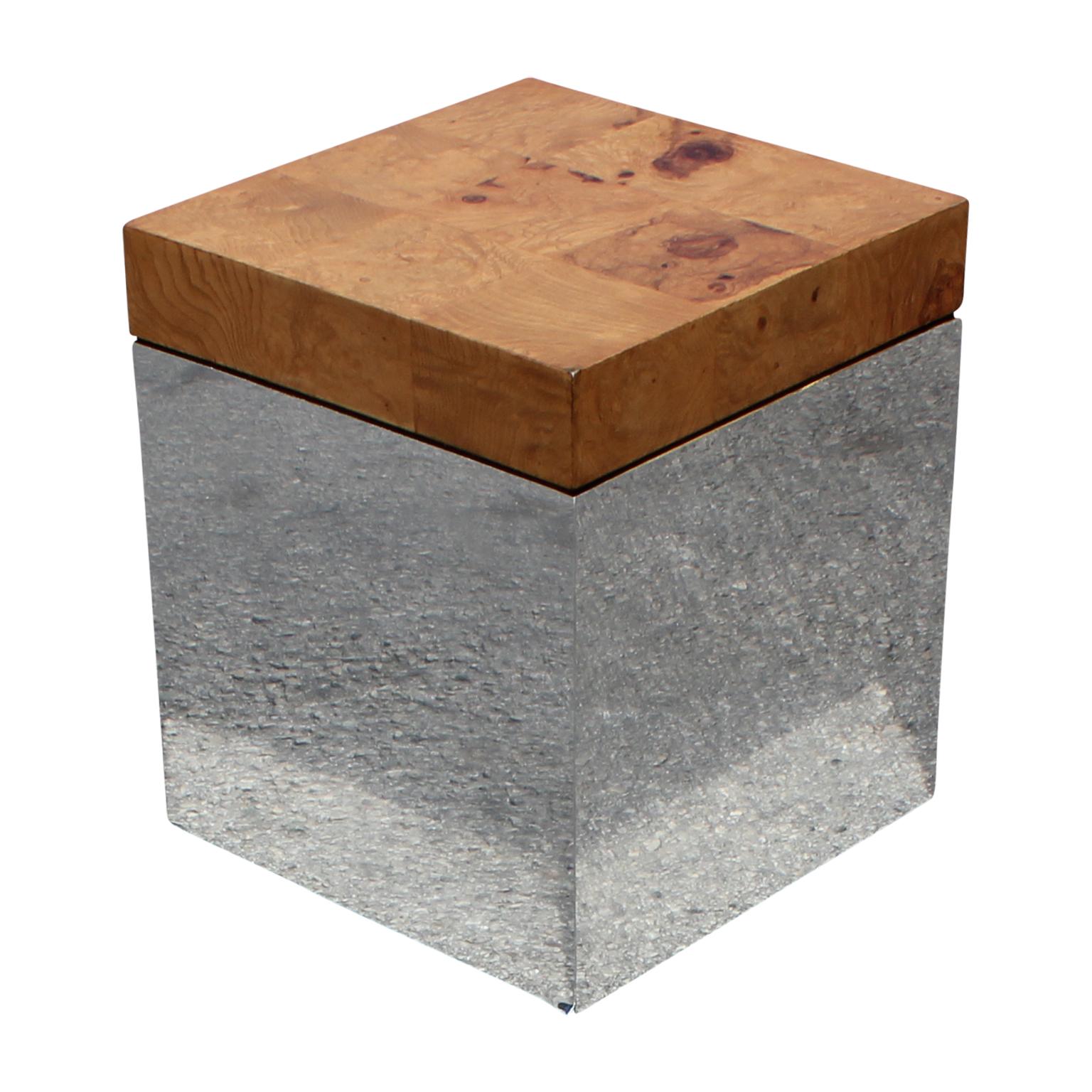Stunning end tables or pedestals. They are made from burl wood in a patchwork patter and have a chrome base. They are by Milo Baughman for Thayer Coggin.