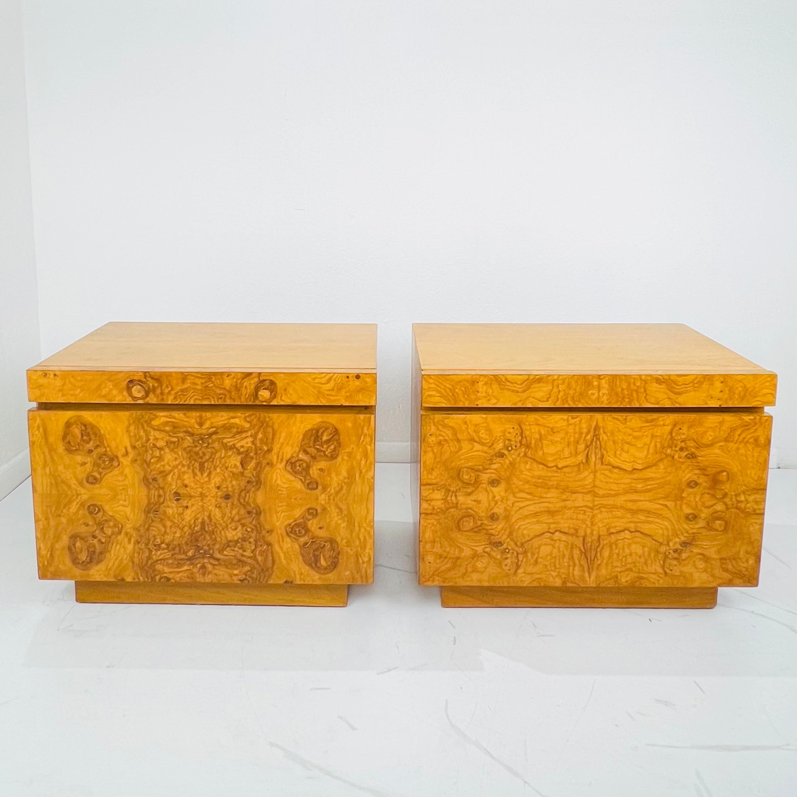 Stunning Vintage Mid-Century Modern pair of burl wood nightstands by Milo Baughman for Lane.

The timeless beauty of burl wood, a naturally occurring wood pattern, and clean modernist lines make these nightstands a standout. The bedside tables
