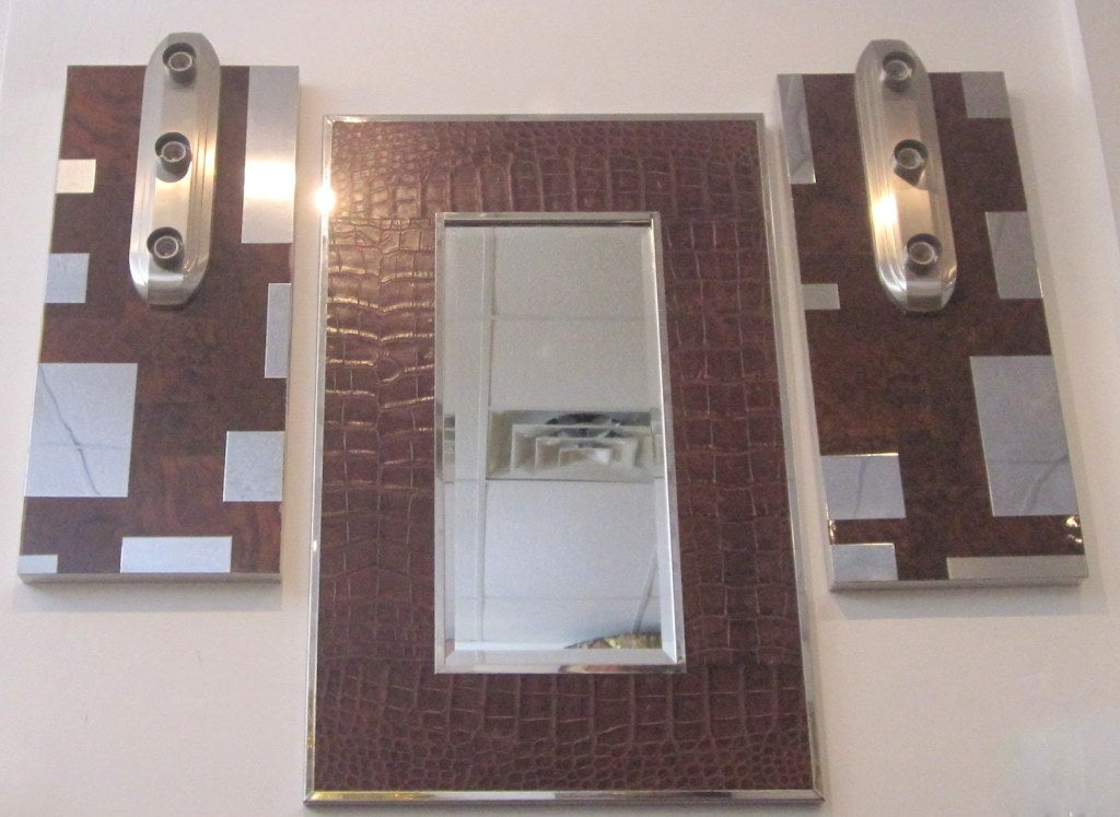 A pair of very attractive burl wood sconces with brushed, mirror polished steel accents, and exposed bulb sockets.