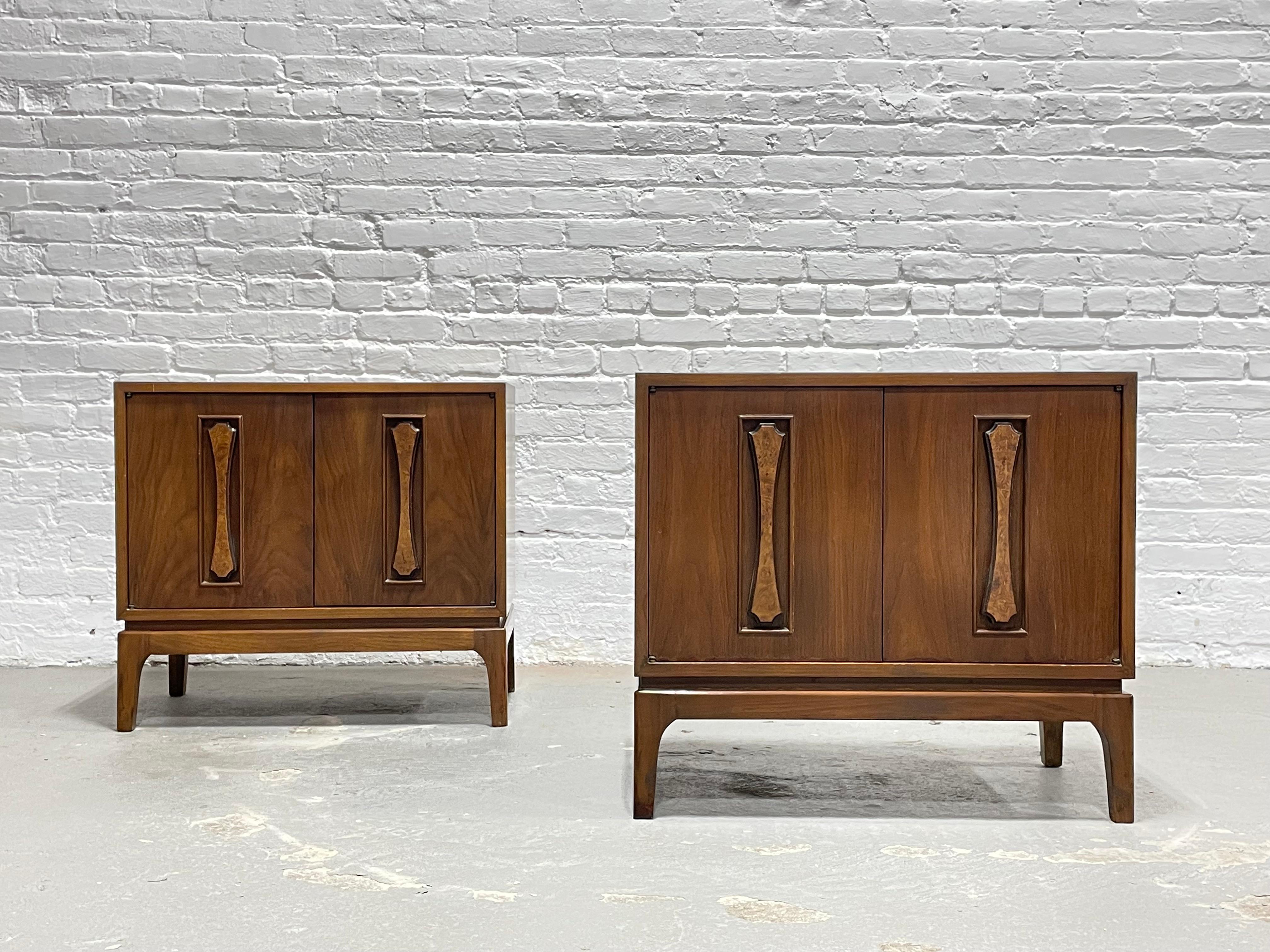 Pair of Mid-Century Modern Burlwood Walnut Nightstands, circa 1960s. These gorgeous bedside tables feature sculpted burlwood inserts, solid construction and a single wide shelf in each cabinet. Lovely vintage condition with wear from age and use