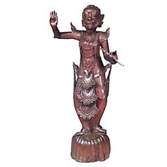 Paire de figurines en teck sculpté de Birmanie