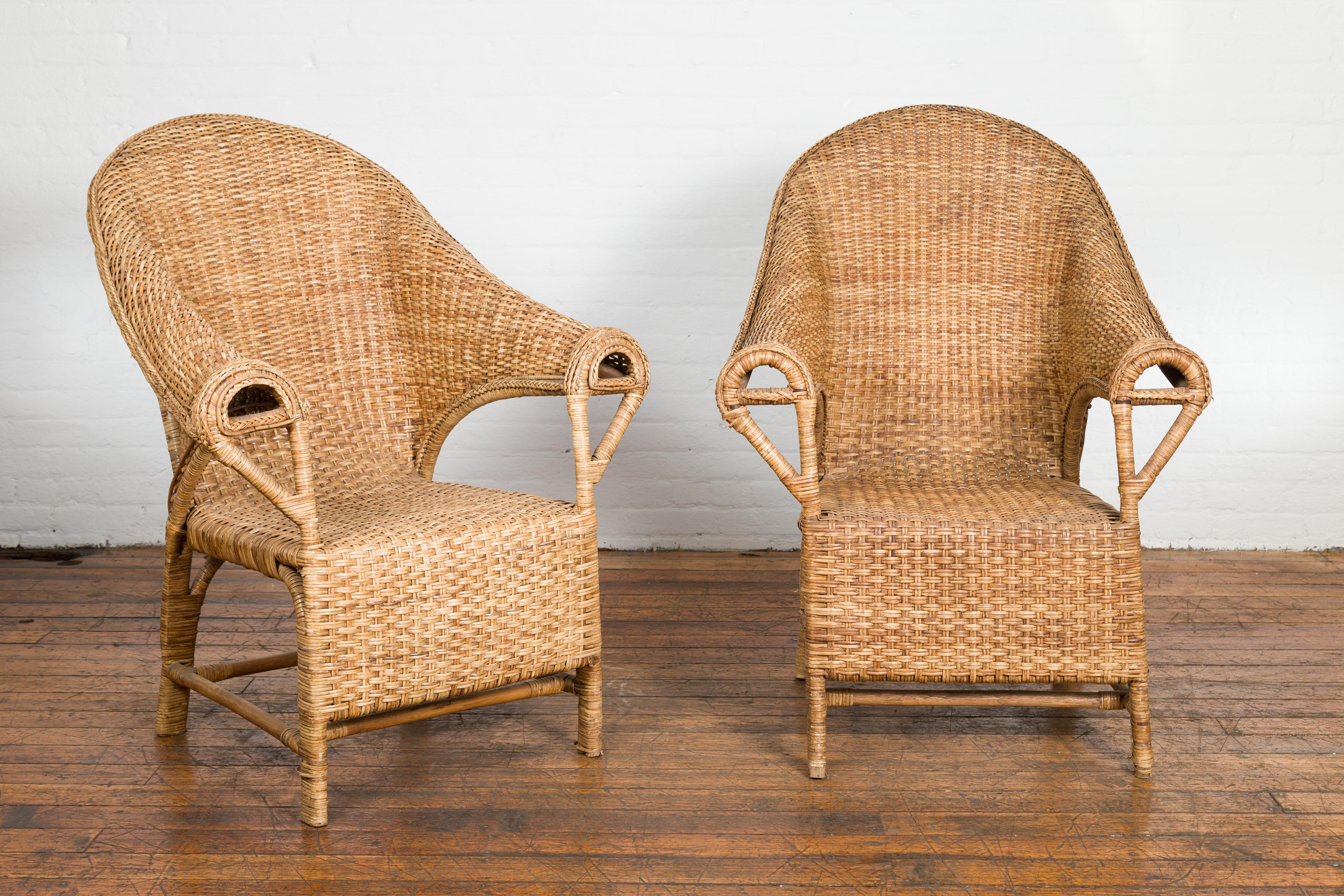 Country Pair of Burmese Vintage Woven Rattan Lounge Chairs with Out Scrolling Arms