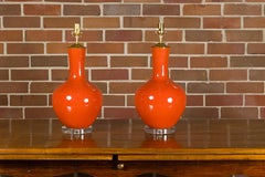 Pair of Burnt Orange Asian Porcelain Table Lamps on Lucite Bases, USA Wired