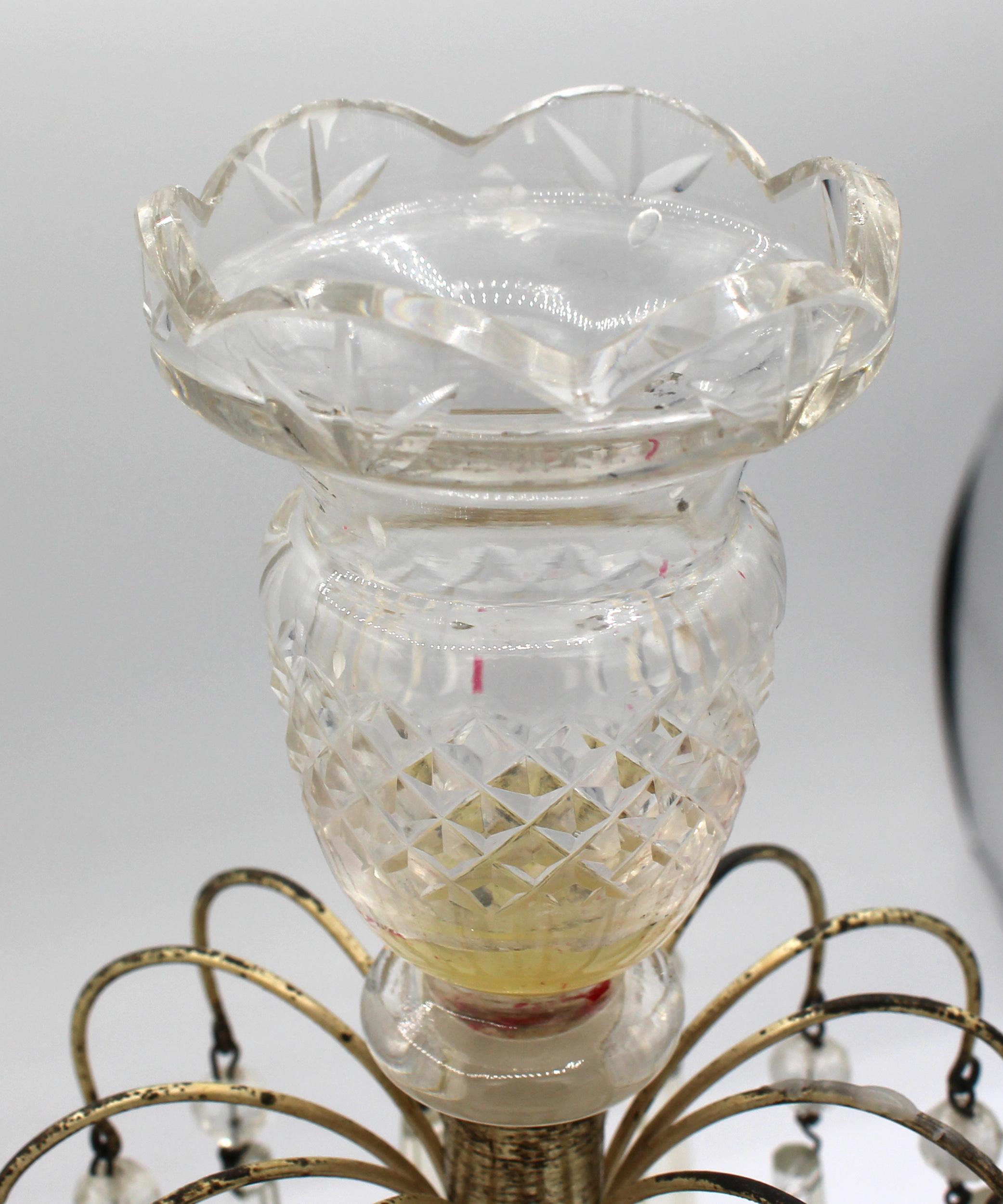 Circa 1860 pair of Irish glass & silverplate girandoles (candle holders). Georgian style, revival period. Minute chips on bases. Some old prism replacements.
11.75