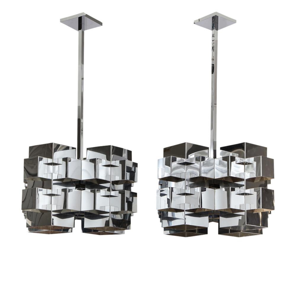 C. Jere cubist chandeliers, chrome steel. Matched pair of nickel-plated chrome cubist form chandeliers by C. Jere for Artisan House of California. Both have been rewired and fitted with custom chrome-plated 24 inch square stock extension rods and