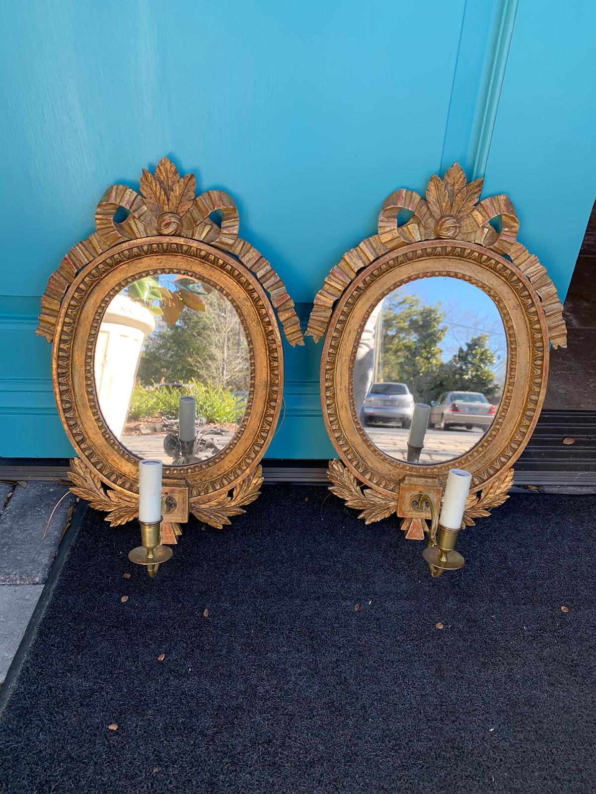 Pair of circa 1800 Swedish gilt mirrored sconces, one light.
Brand new wiring.