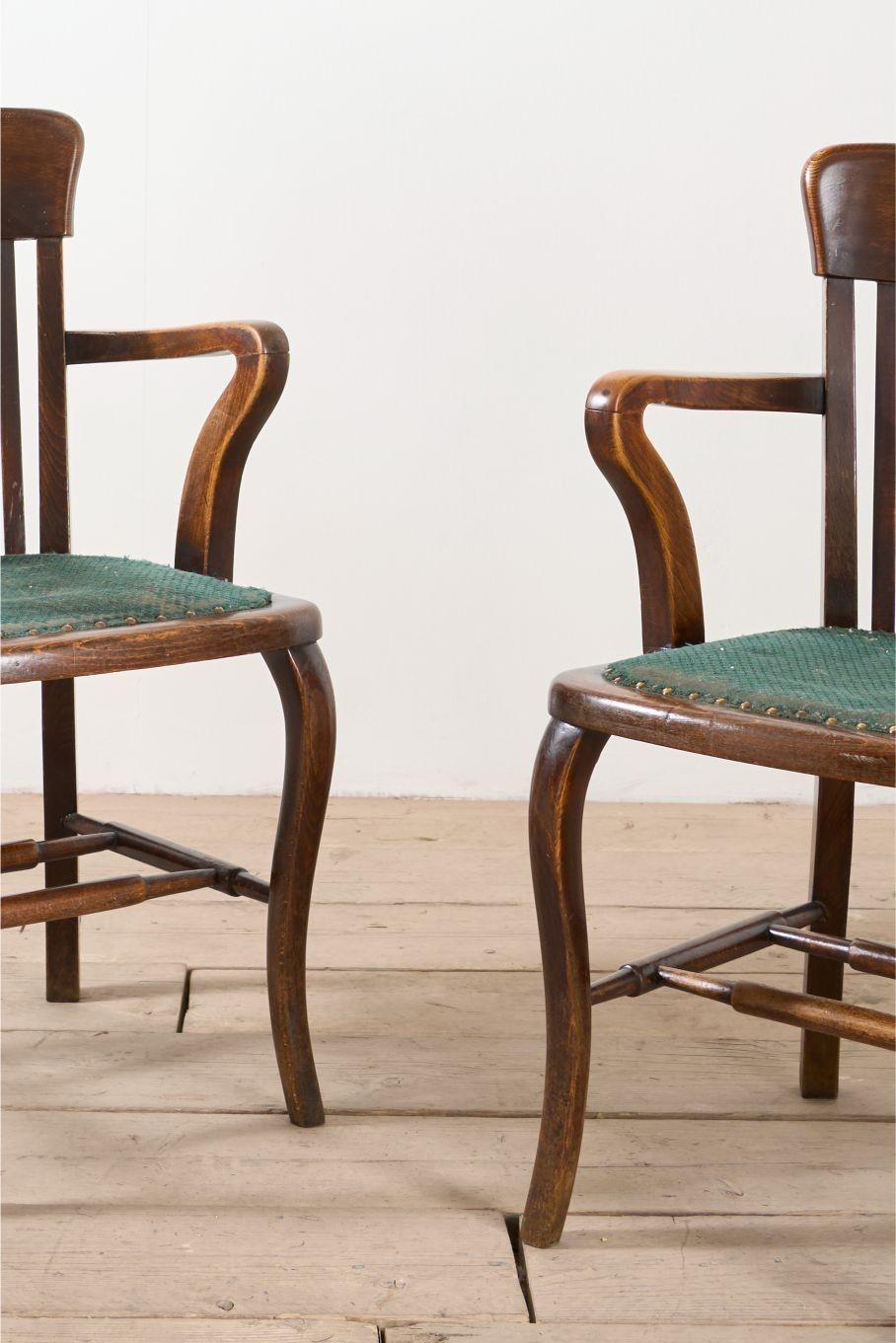 These are a great looking pair of 1920's armchair's. Ideal occasional seating or desk chairs. The fabric covered seat can be replaced but looks to be original. The condition overall is very good and the design is classic British which will sit well