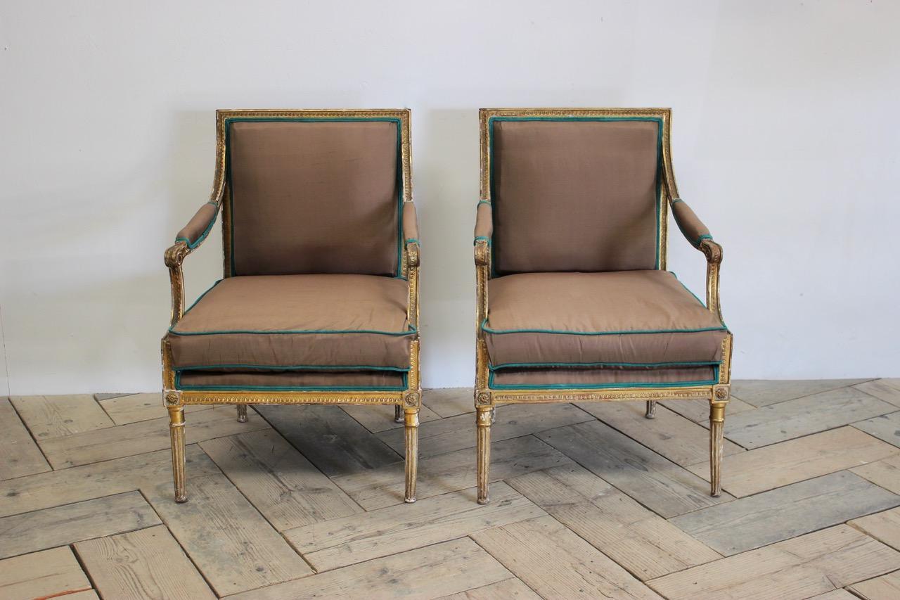 Fine pair of early 19th century, possibly Scandinavian, Country House fauteuils,of classical design, retaining the original decoration and gilding and having been reupholstered in silk, with a hand dyed antique linen piping.
Losses and