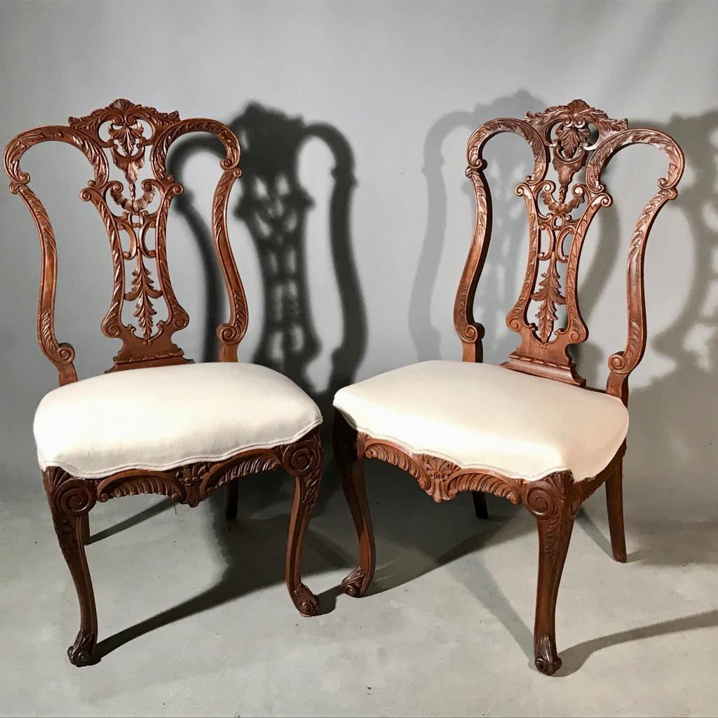Super quality pair of 19th century French walnut carved side chairs with fantastic carving to the backs and scrolling legs.
Very decorative pair of chairs, but certainly very much a useable pair of chairs too, whether as a pair of hall chairs, or