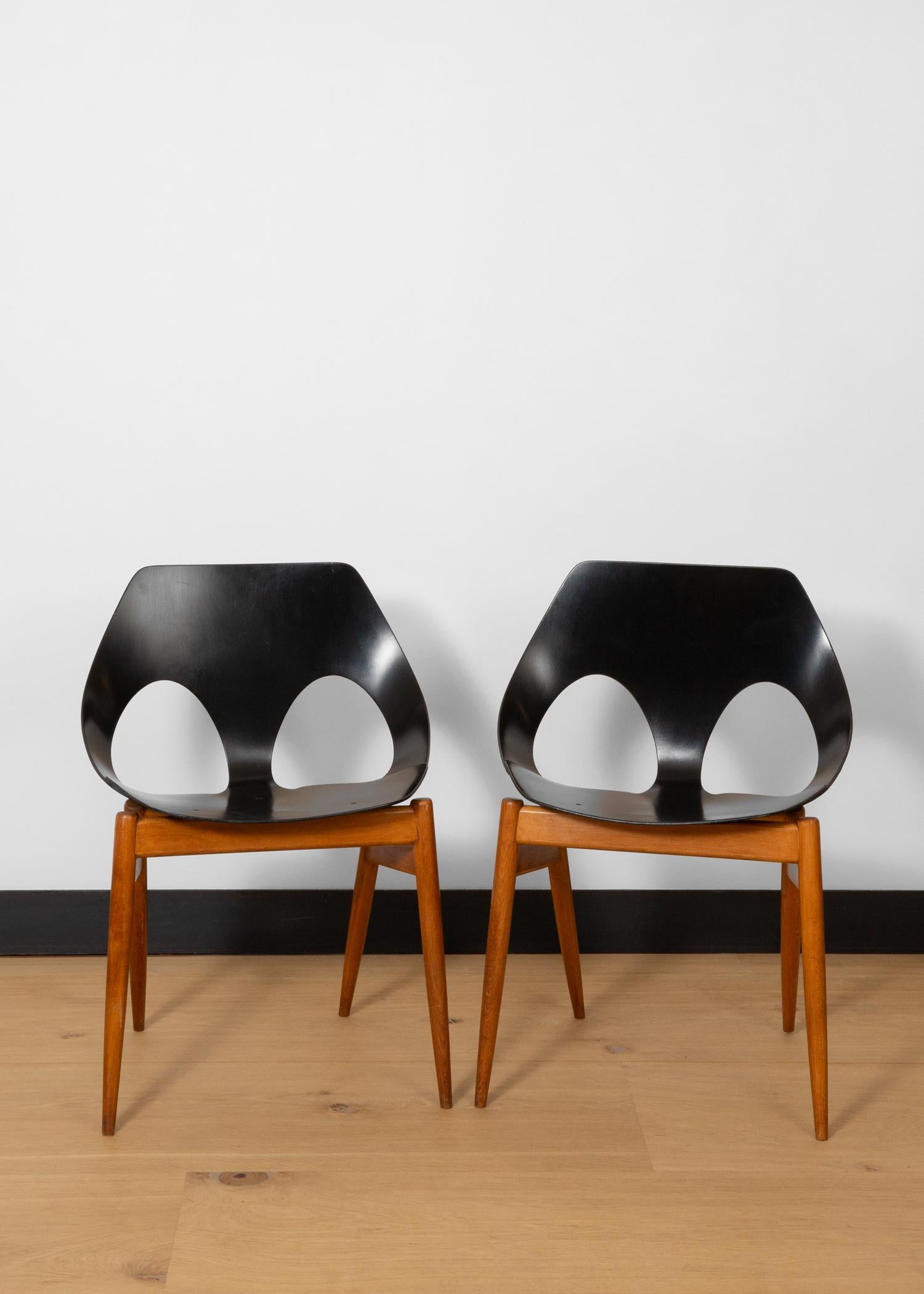 A pair of 'C2' of 'Jason' chairs in black painted beech laminate, designed by Danish designer Carl Jacobs for the British manufacturer Kandya.