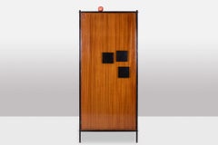 Pair of cabinets in mahogany veneer and black lacquered iron. 1950s.