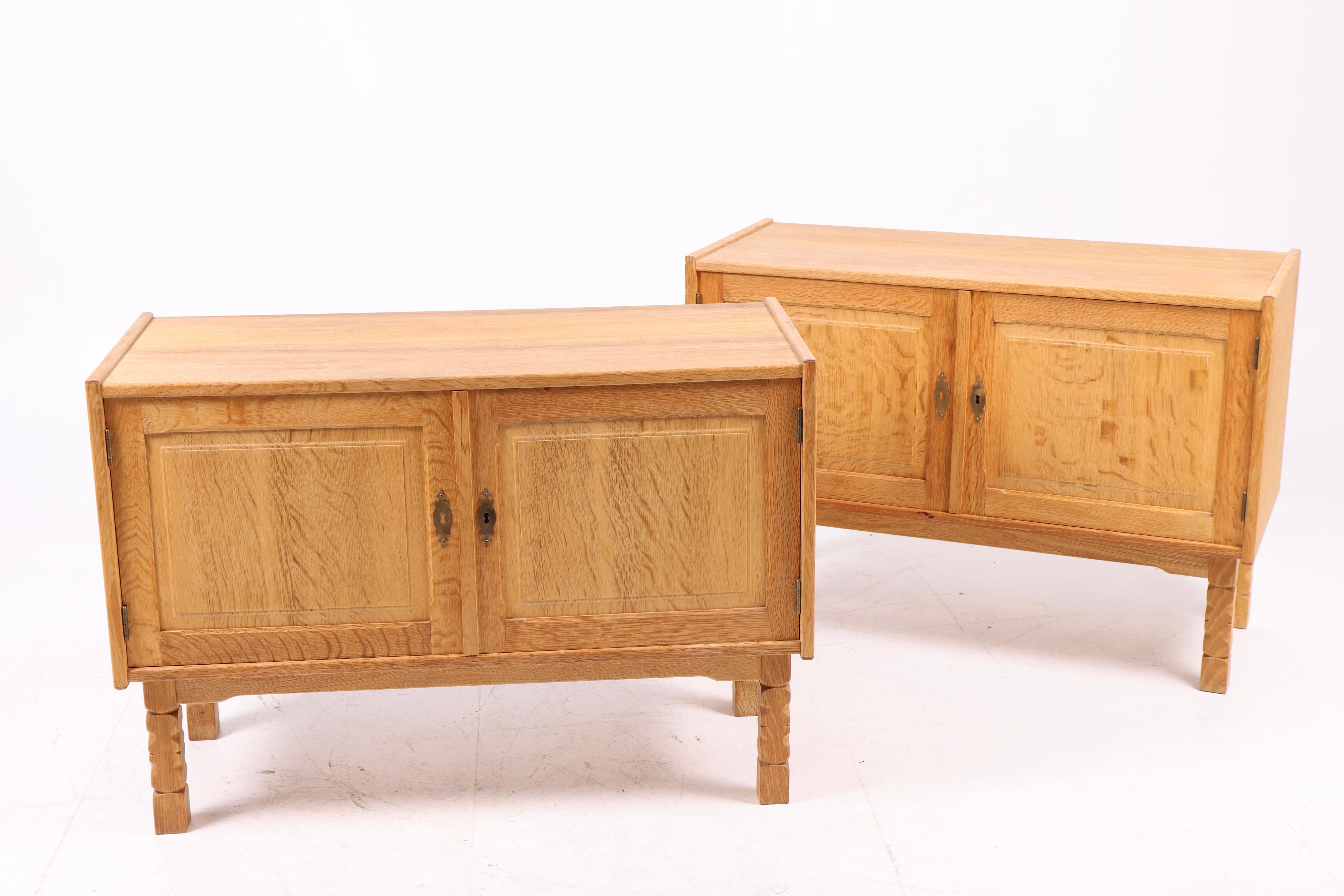 Pair of cabinets in soap scandinavian oak. Designed and made in Denmark in the 1960s. Great original condition.
