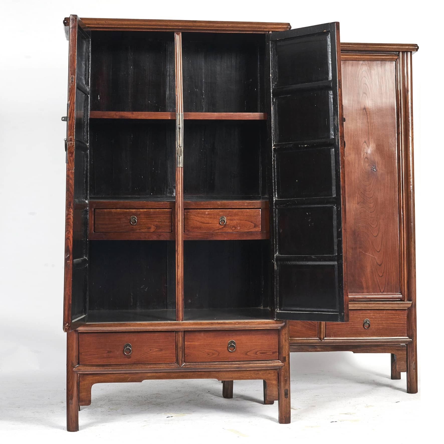 Pair of cabinets in Ming style, early 19th century.

Made in the beautiful wood Jumu, also called southern elm (Looks some what like walnut wood in its structure and veining). Found only in China.
Furniture in Jumu wood is in great demand today,