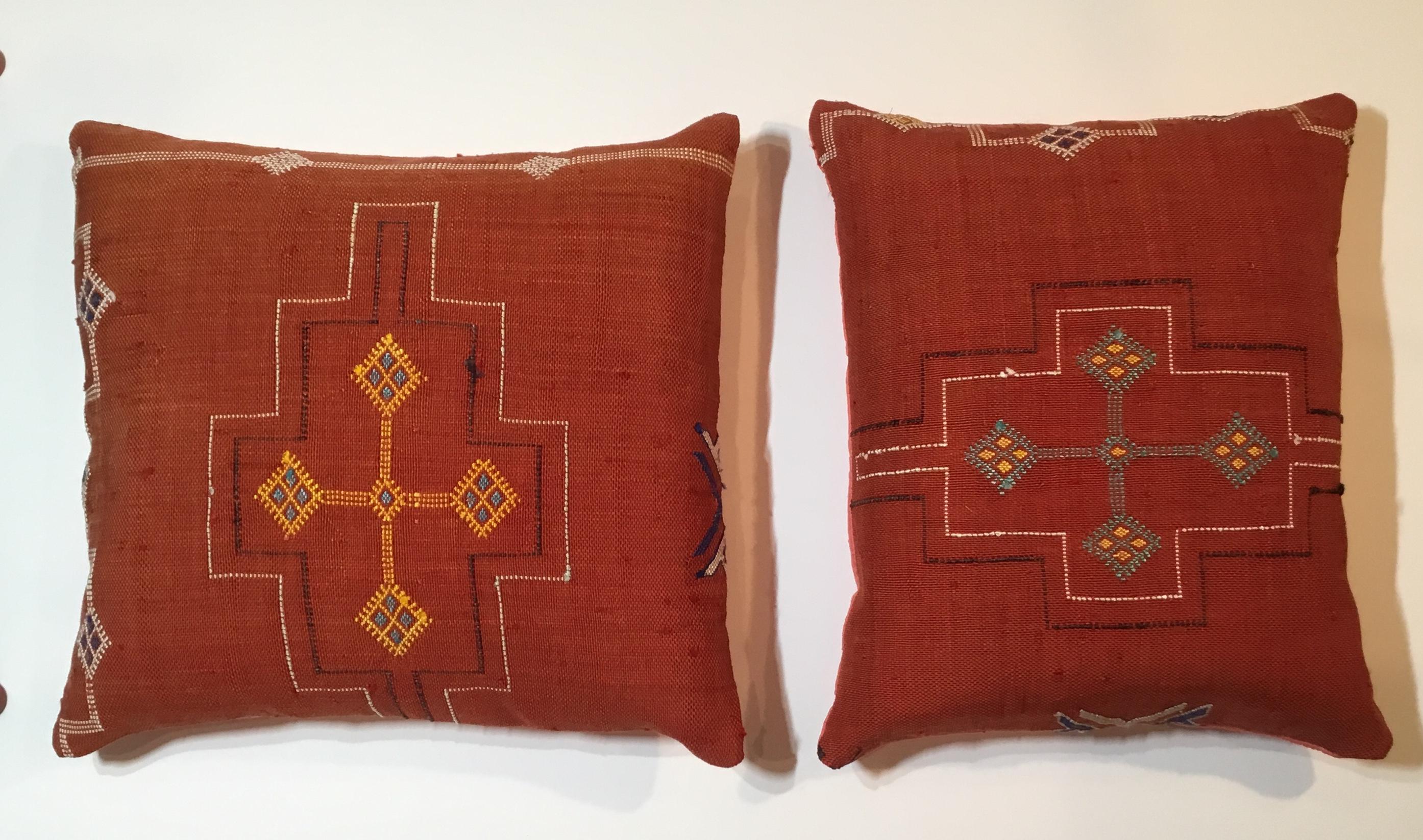 Beautiful pair of pillows made of hand woven flat-weave textile with multi colors geometric motifs on a red background, fine silk backing frash inserts.
Sizes:
1. 19”.5 x 18”.5 x4”
2. 19”.5 x 16” x. 4”.