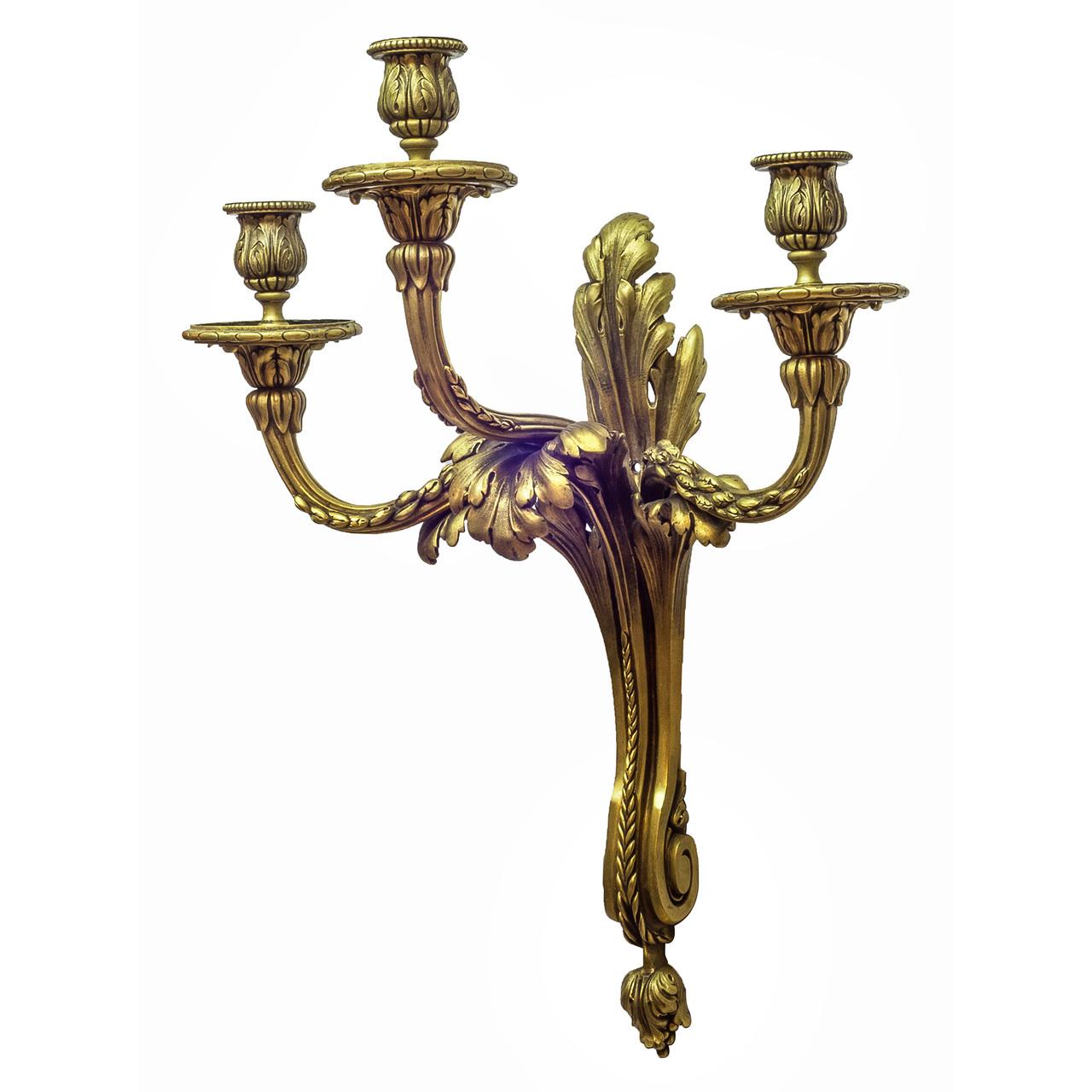 An exceptional pair of Caldwell gilt bronze three light sconces, featuring an acanthus leaf design

Maker: Edward F. Caldwell Co. (1851-1914)
Date: circa 1900s
Origin: American
Size: 19 x 15-1/2 x 11-1/2 inches.